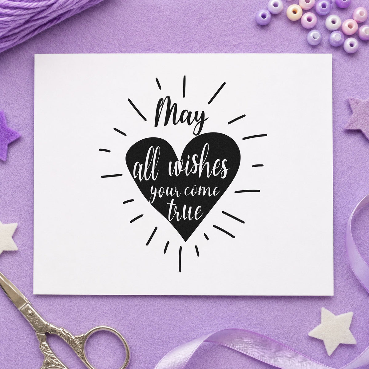 May Wishes Come True craft stamp imprint in black ink on a handmade project, one idea being blessing gift tags.
