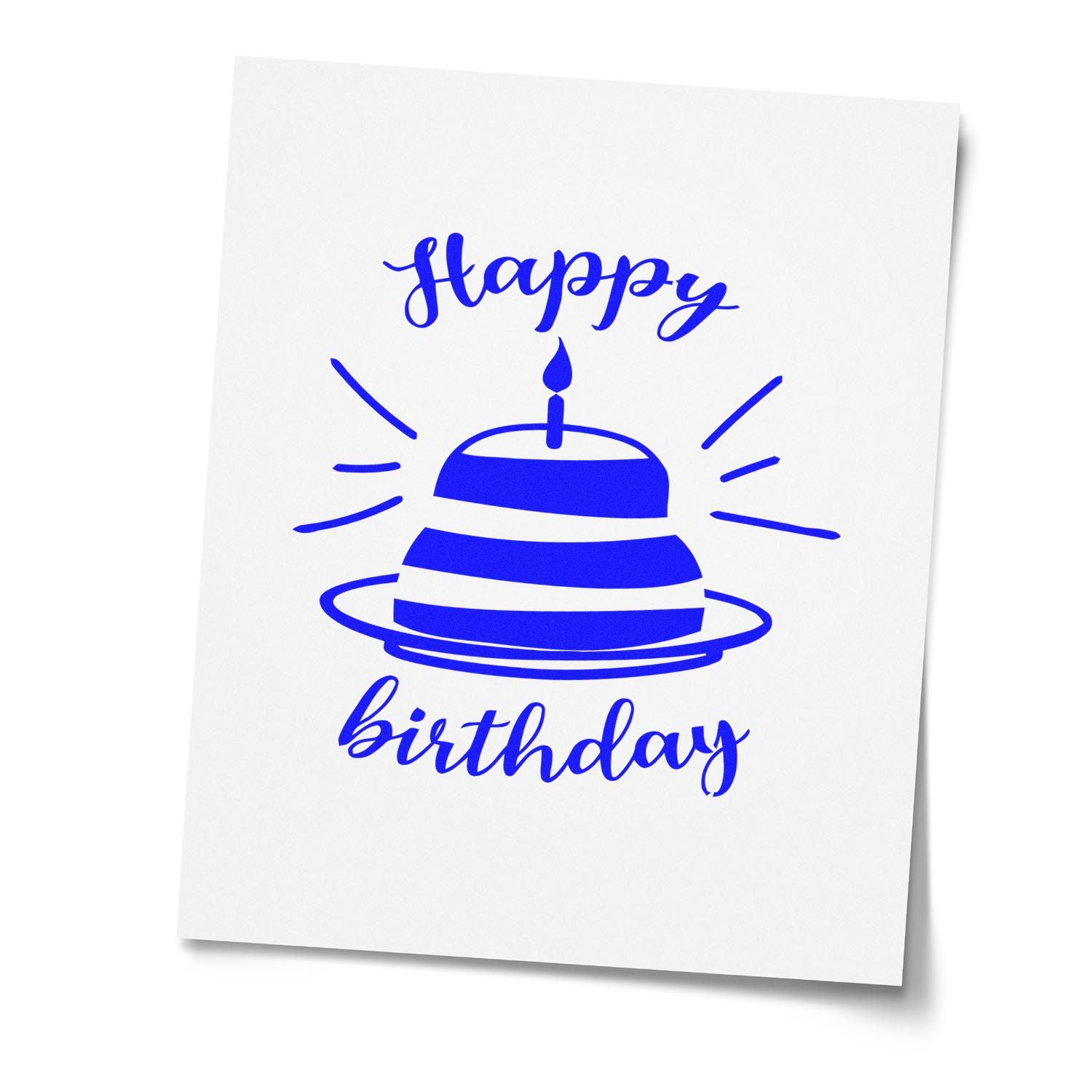 Blue Happy Birthday cake rubber stamp design with candle and festive accents on white paper.