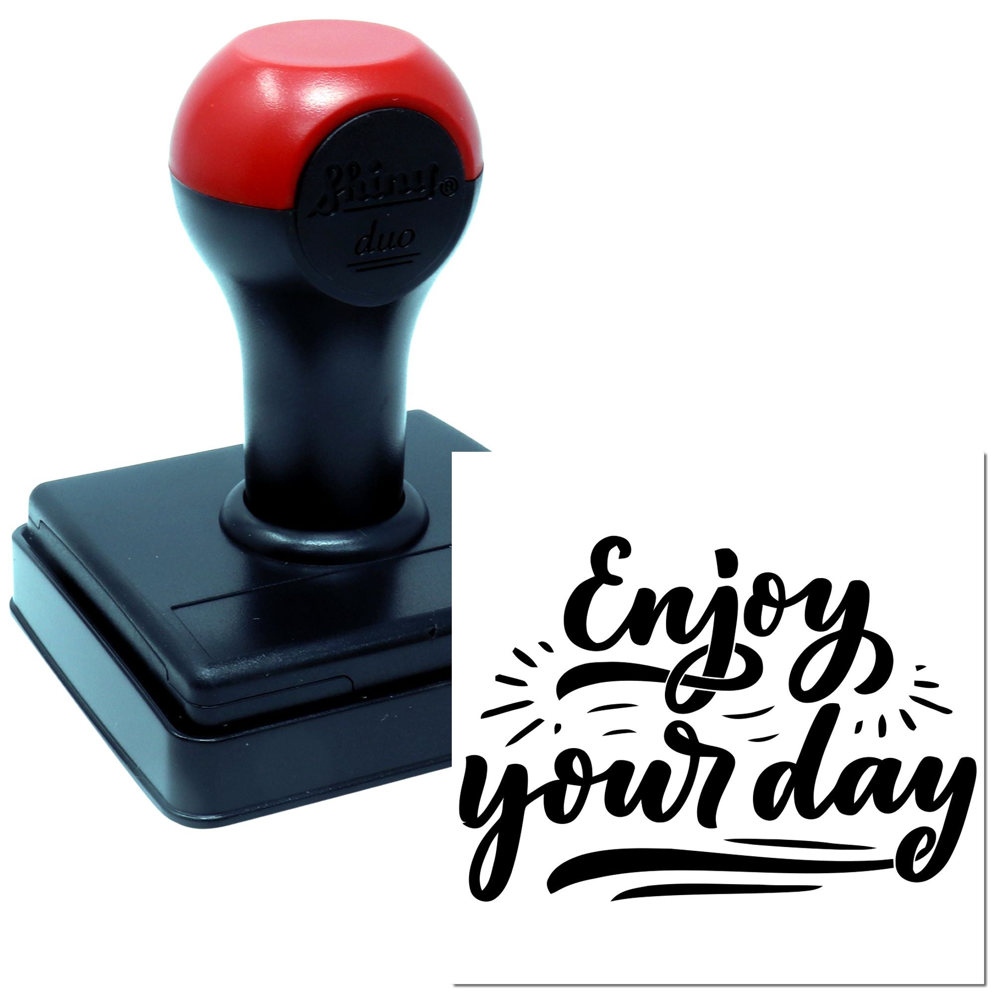 Self-inking rubber stamp with Enjoy your day design for cards, packaging, and cheerful business branding.