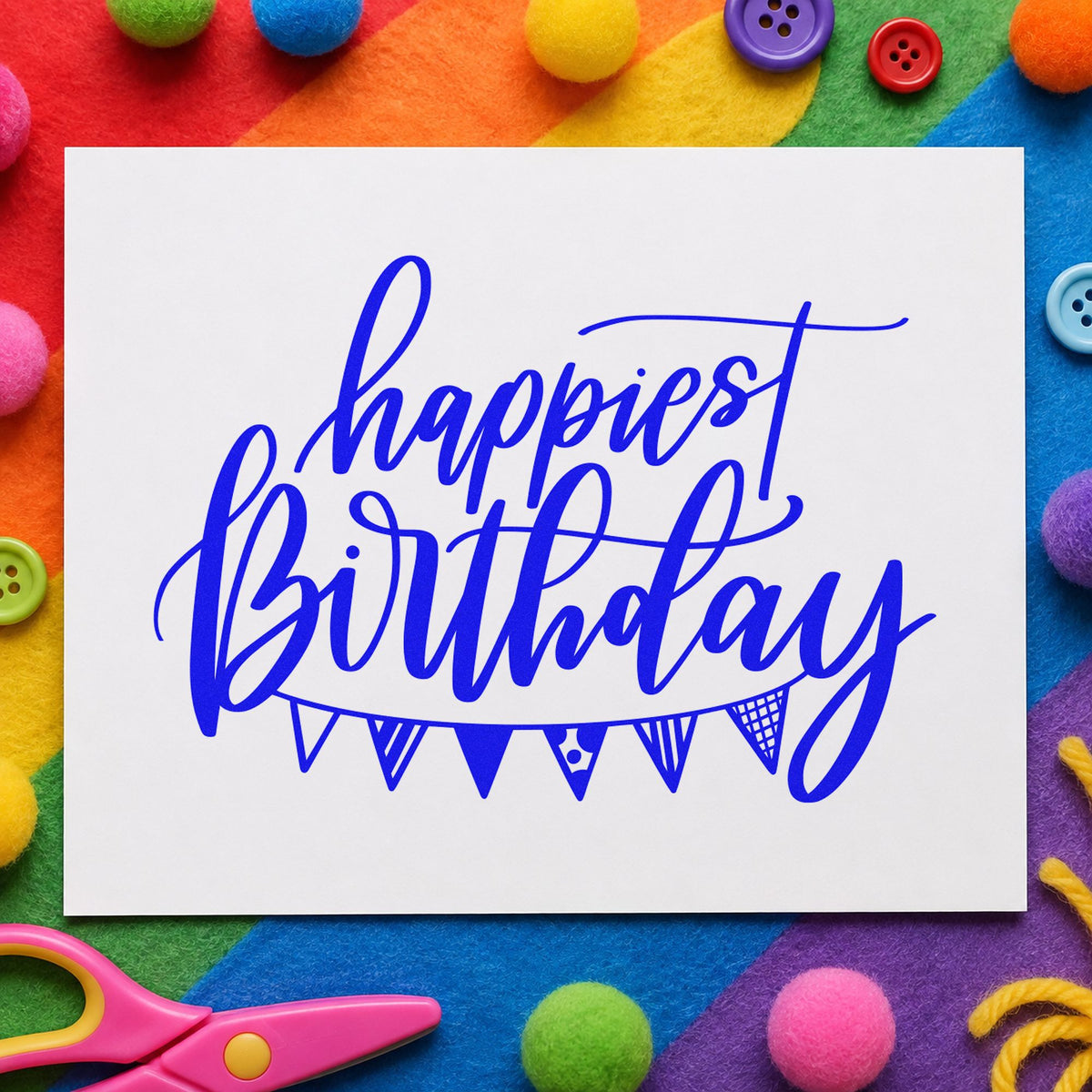 Happiest Birthday Pennant Bunting craft stamp in blue ink on cardstock, an easy option for stall cloth printing.