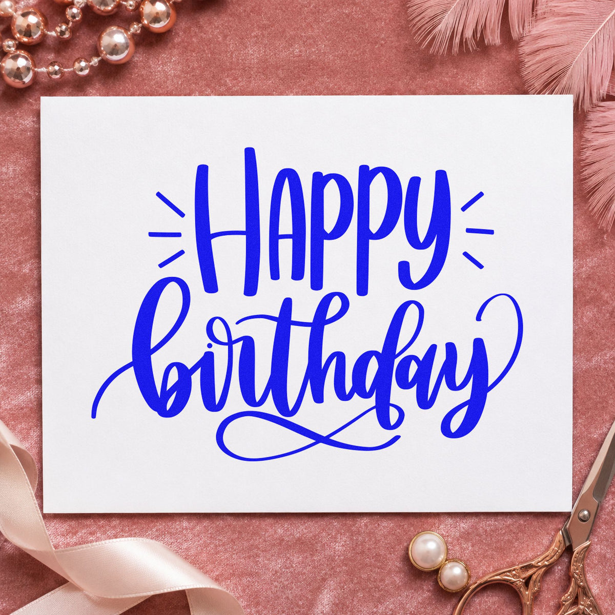 Happy Birthday Loop Flourish craft stamp imprinted in blue ink on paper, a design suited to framed van interior.
