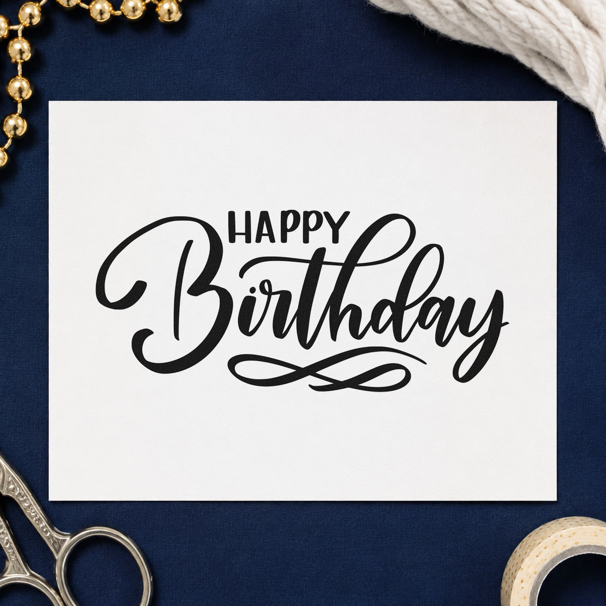 Happy Birthday Infinity Flourish craft stamp in black ink on cardstock, an easy option for aquarium album page.