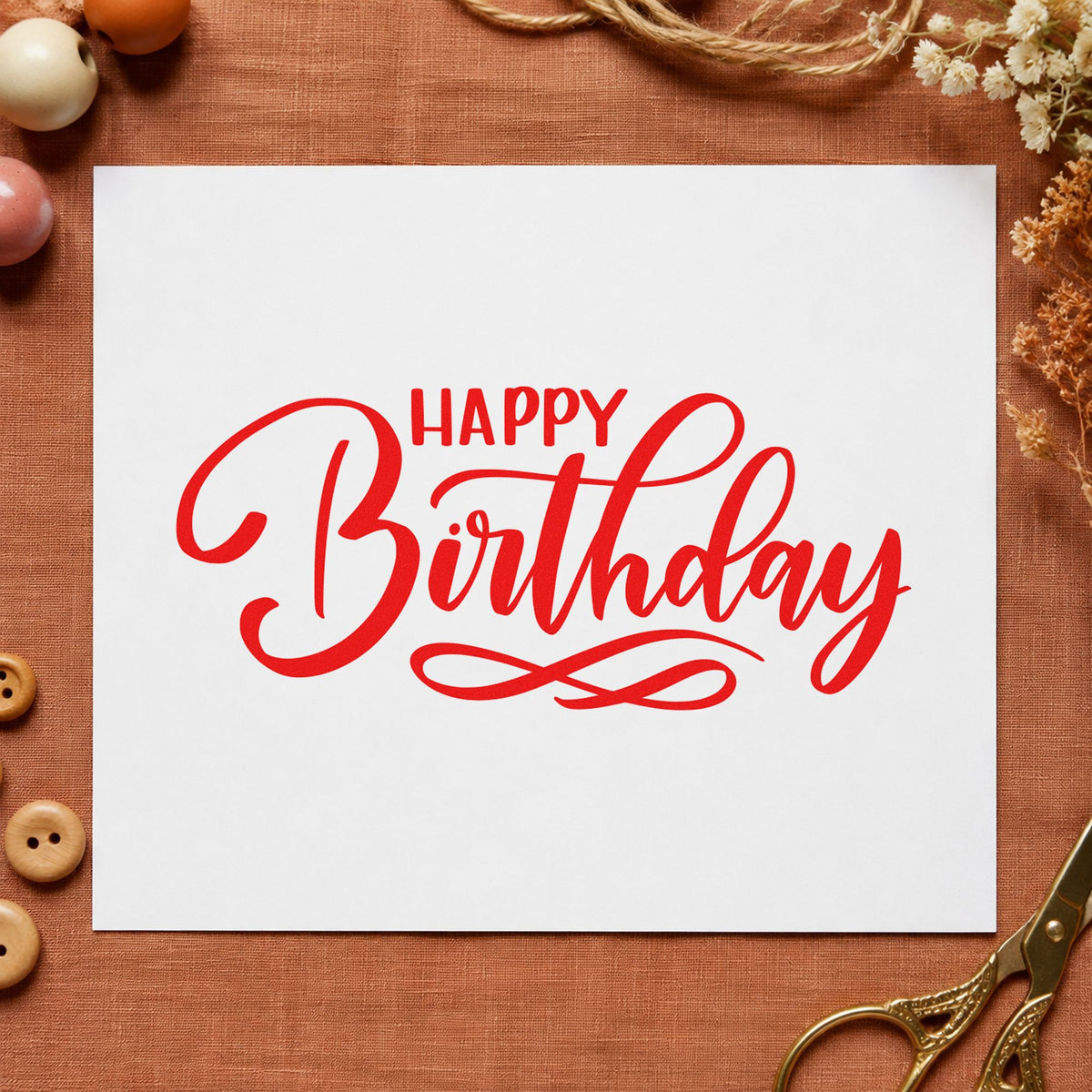Happy Birthday Infinity Flourish craft stamp imprint in red ink on a handmade project, one idea being species find cards.