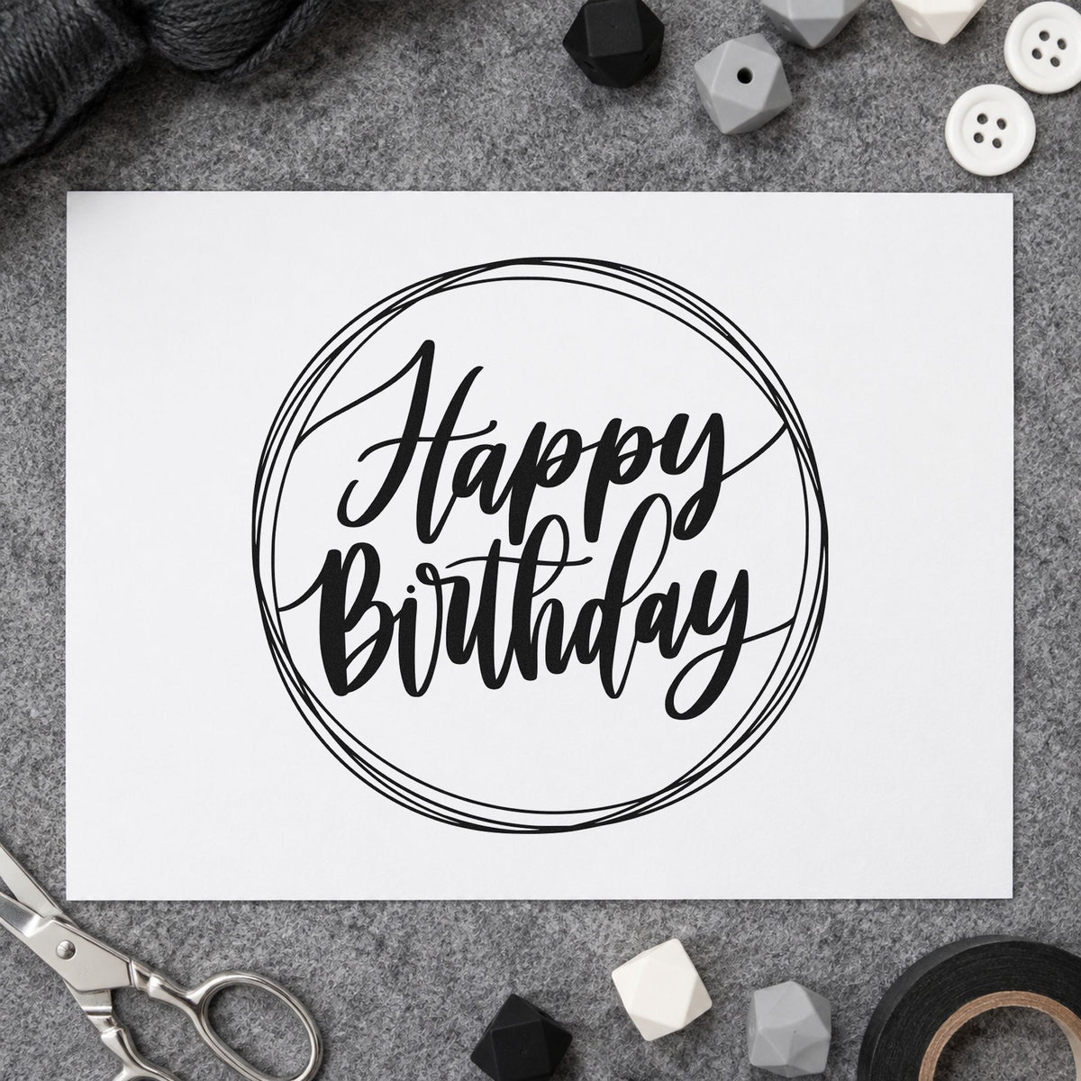 Happy Birthday Circular Frame craft stamp imprint in black ink on a handmade project, one idea being chalk pack gift tags.