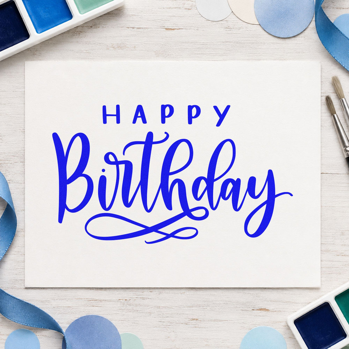 Happy Birthday Loop Underline craft stamp in blue ink on cardstock, an easy option for book bag printing.