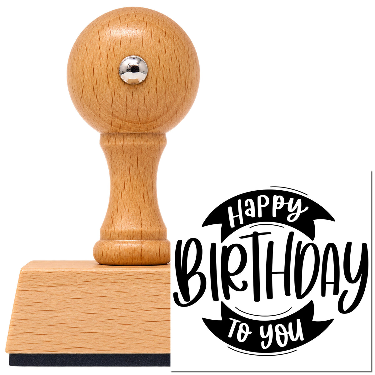 Happy Birthday Double Ribbon Lettering Vintage Pro rubber stamp in European beech wood with a round knob handle, shown beside its black imprint.