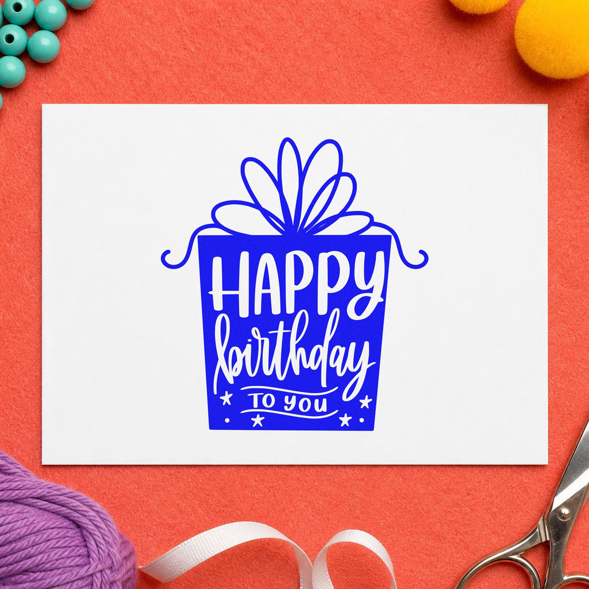 Birthday Gift Shaped Lettering craft stamp imprinted in blue ink on paper, a design suited to framed wrap counter.