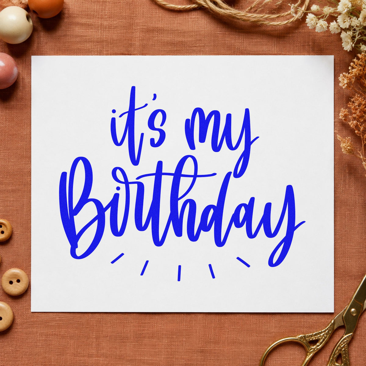 My Birthday Radiating Script craft stamp imprinted in blue ink on paper, a design suited to framed wardrobe door.