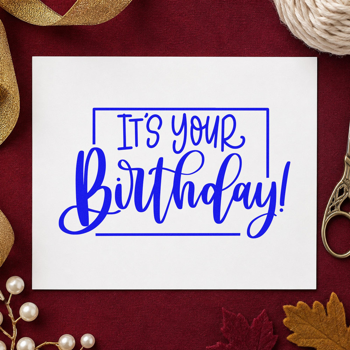 It Is Your Birthday craft stamp in blue ink on cardstock, an easy option for server apron printing.