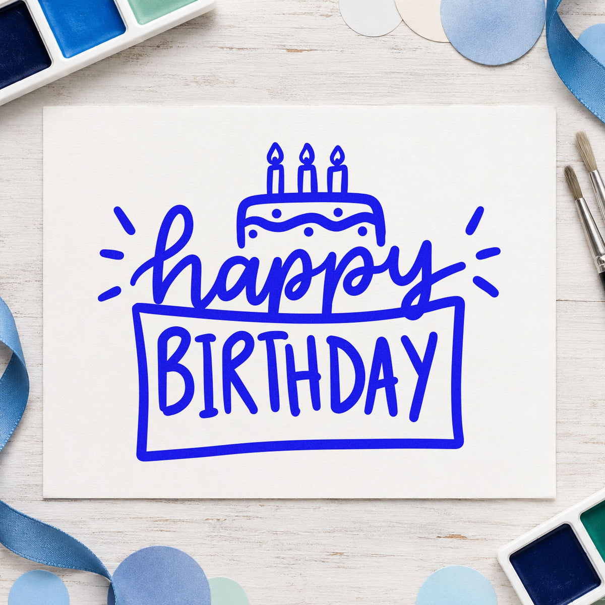 Happy Birthday Cake Frame craft stamp in blue ink on cardstock, an easy option for baking apron printing.