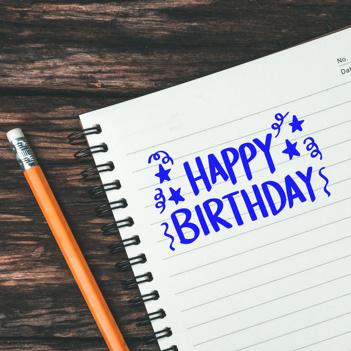 Birthday Stars And Streamers rubber stamp shown in blue ink, stamped for projects such as pavilion album page.