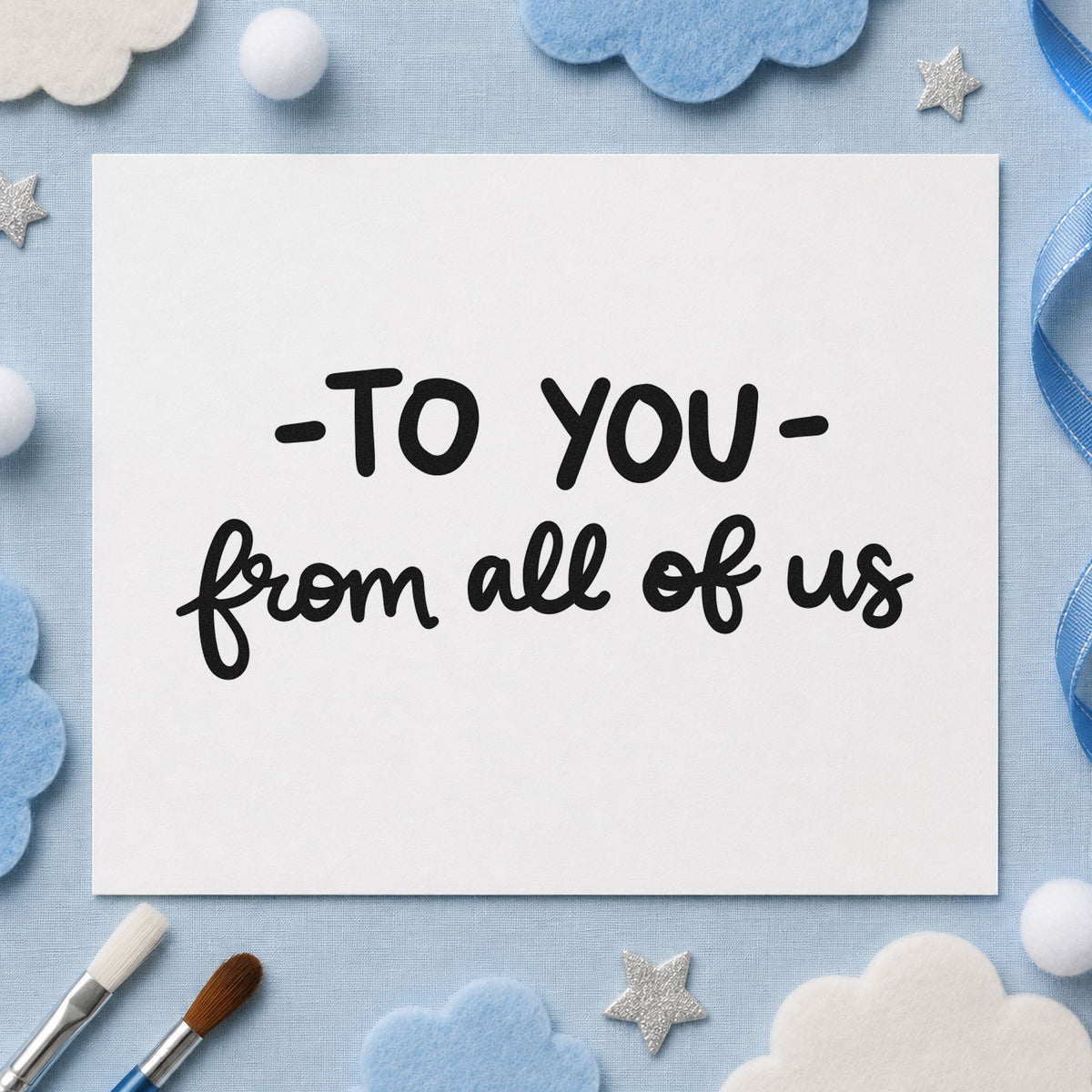 To You From All of Us craft stamp imprint in black ink on a handmade project, one idea being doorstep gift tags.