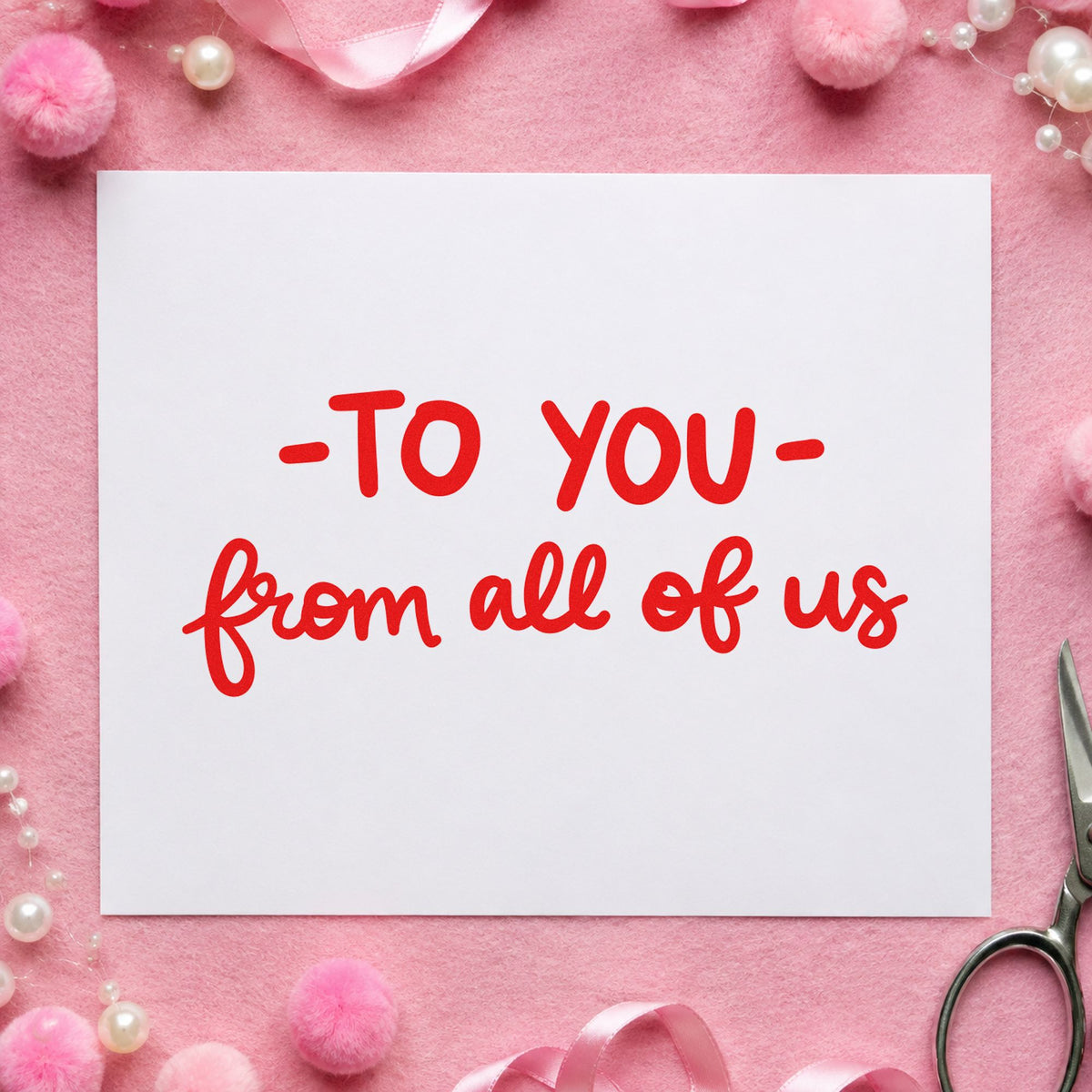 To You From All of Us craft stamp imprint in red ink on a handmade project, one idea being group sign cards.