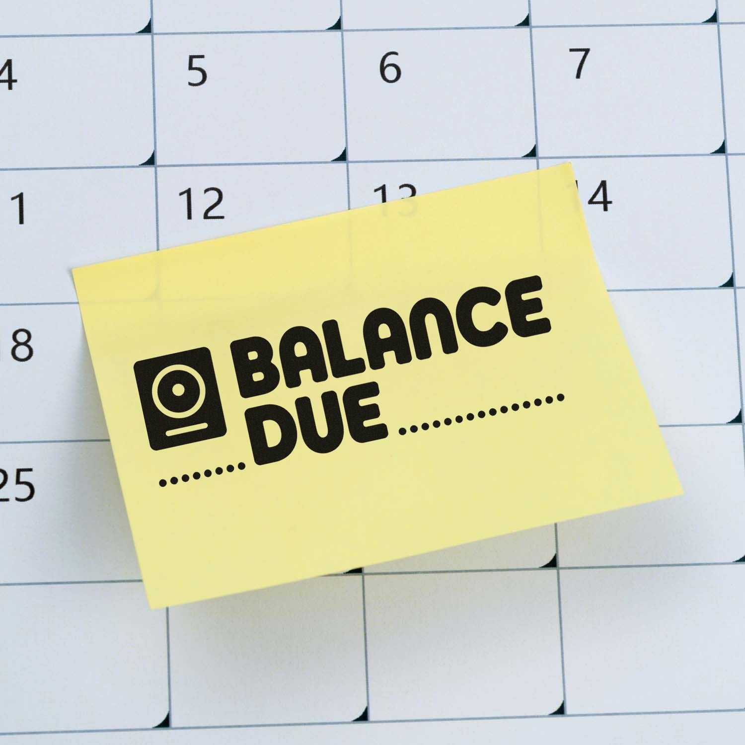 Balance due rubber stamp design on sticky note over calendar, ideal for billing reminders and overdue payment notices.