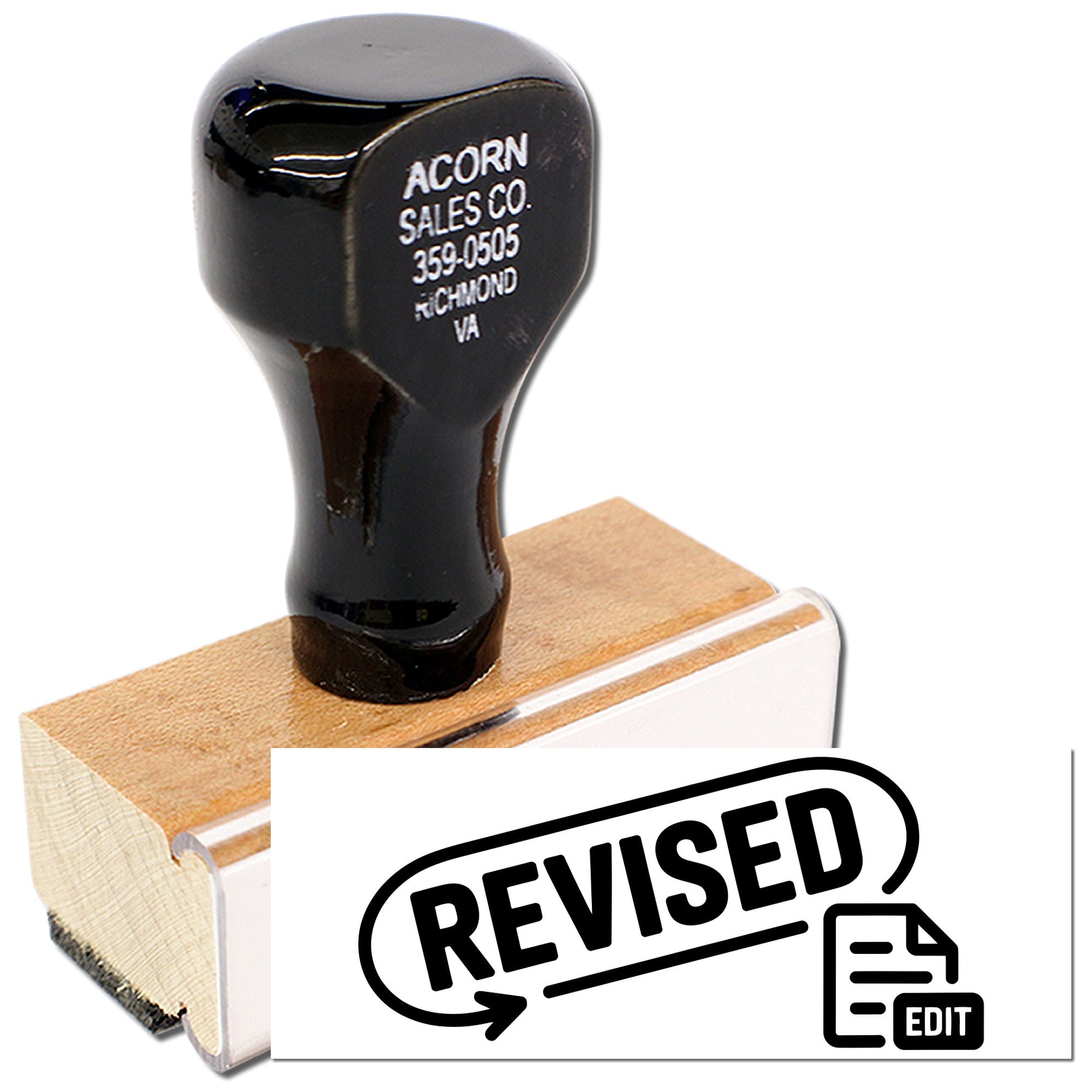 Custom rubber stamp marked Revised for quickly labeling edited documents and file approvals