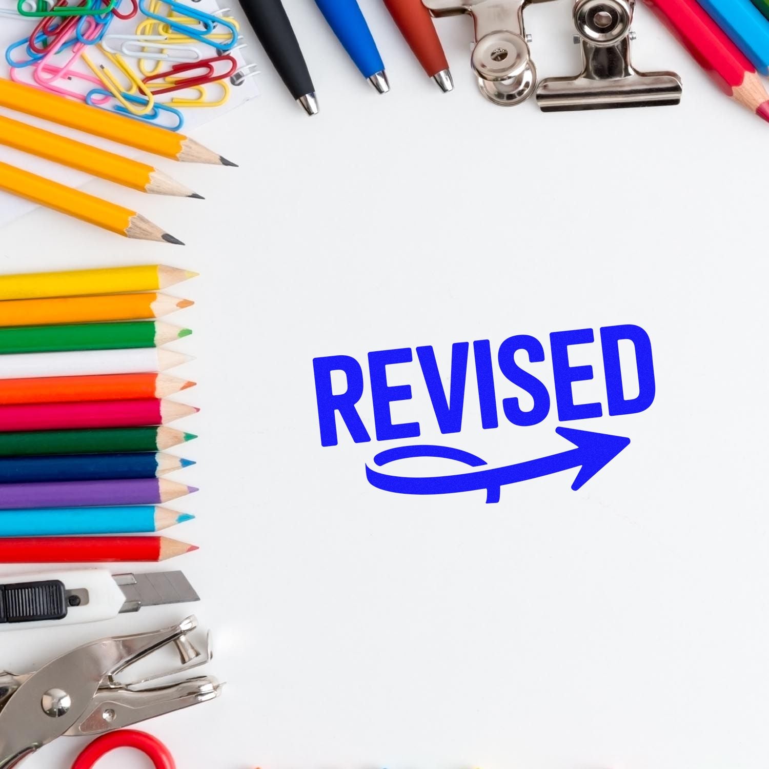 Revised rubber stamp graphic with office supplies, ideal for document review, approval, and editing workflows.
