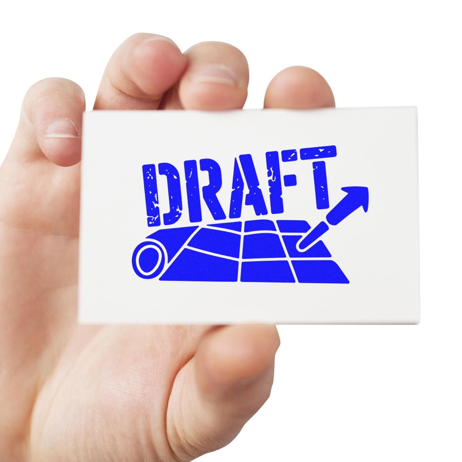 Hand holding a custom rubber draft stamp with blueprint icon for marking documents, plans, and design approvals.