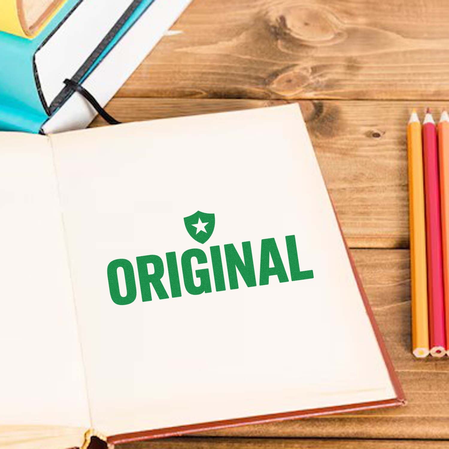 Original rubber stamp imprint on an open notebook, ideal for branding, crafts, and custom stationery.