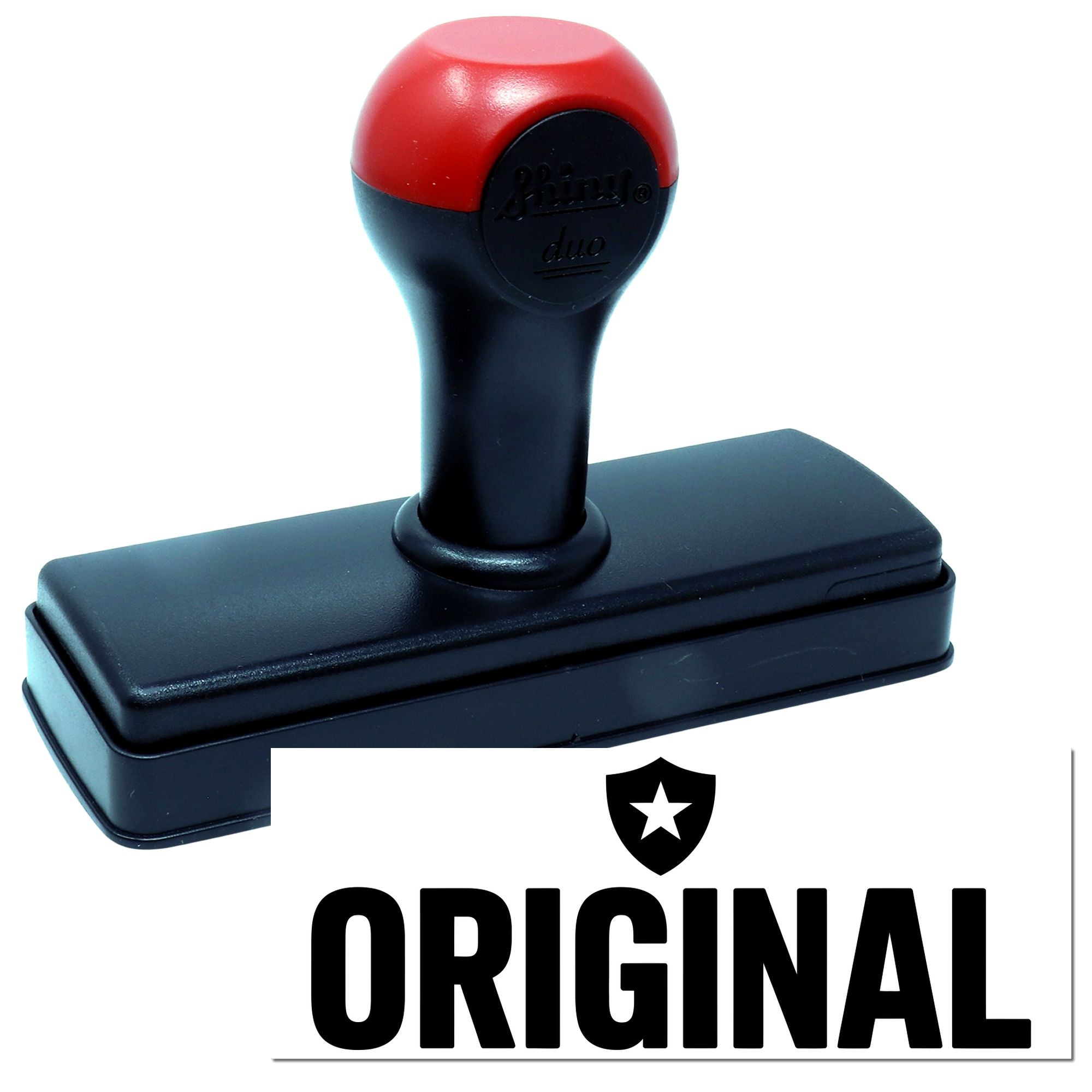 Original self-inking rubber stamp with red-and-black handle for custom business marking and branding.