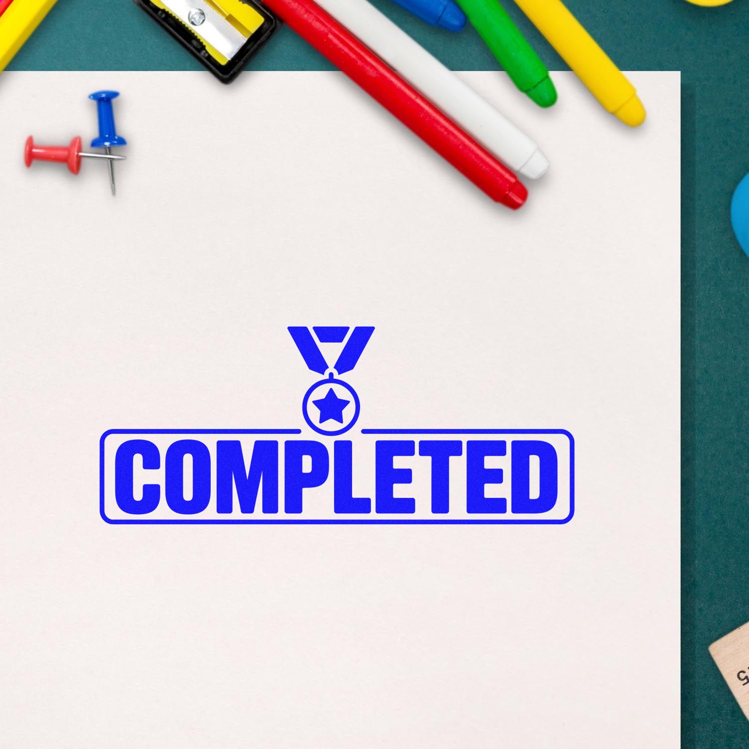 Blue Completed rubber stamp on paper with colorful office supplies, marking project status as finished.