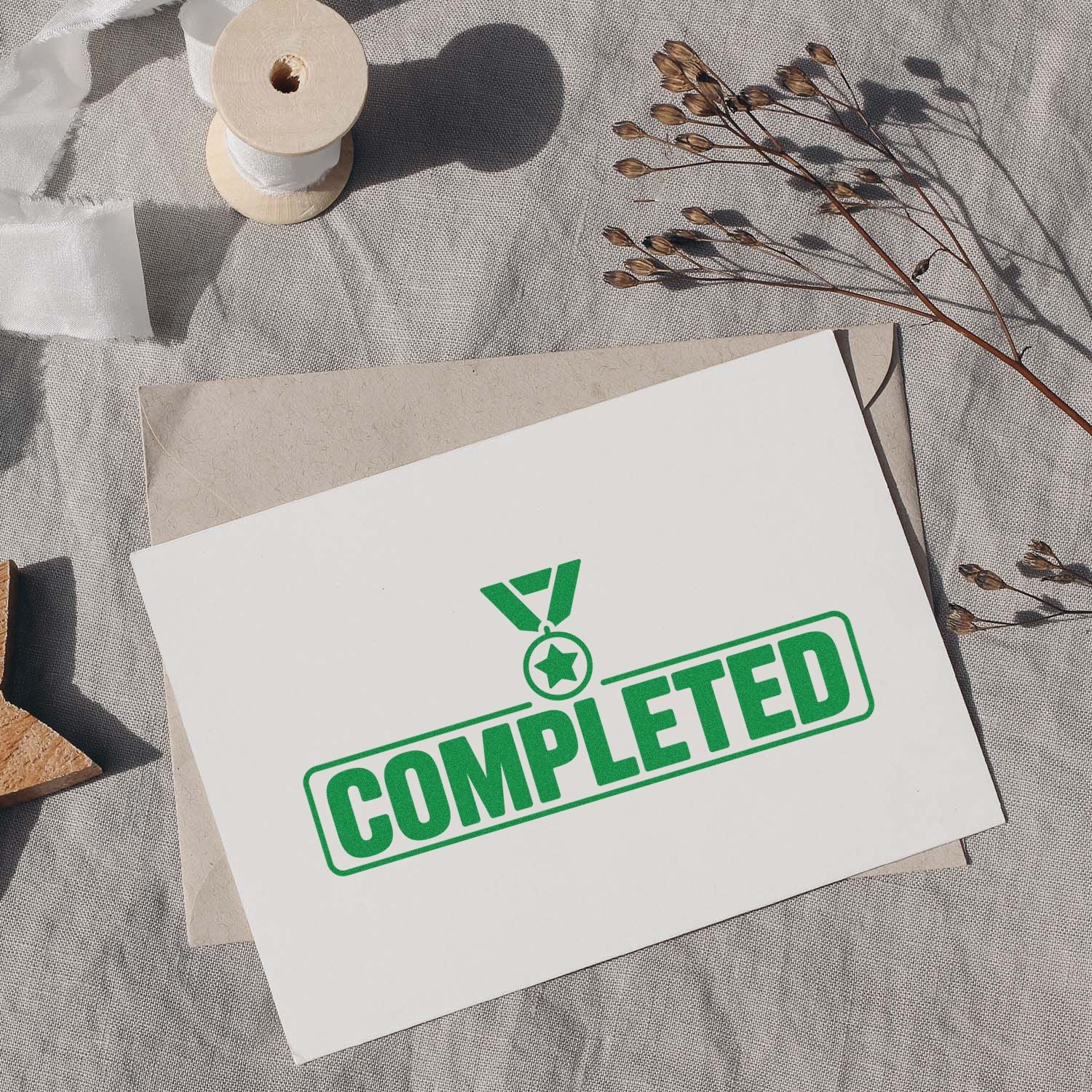 Green Completed rubber stamp imprint on blank card, ideal for office approval and custom business document marking.
