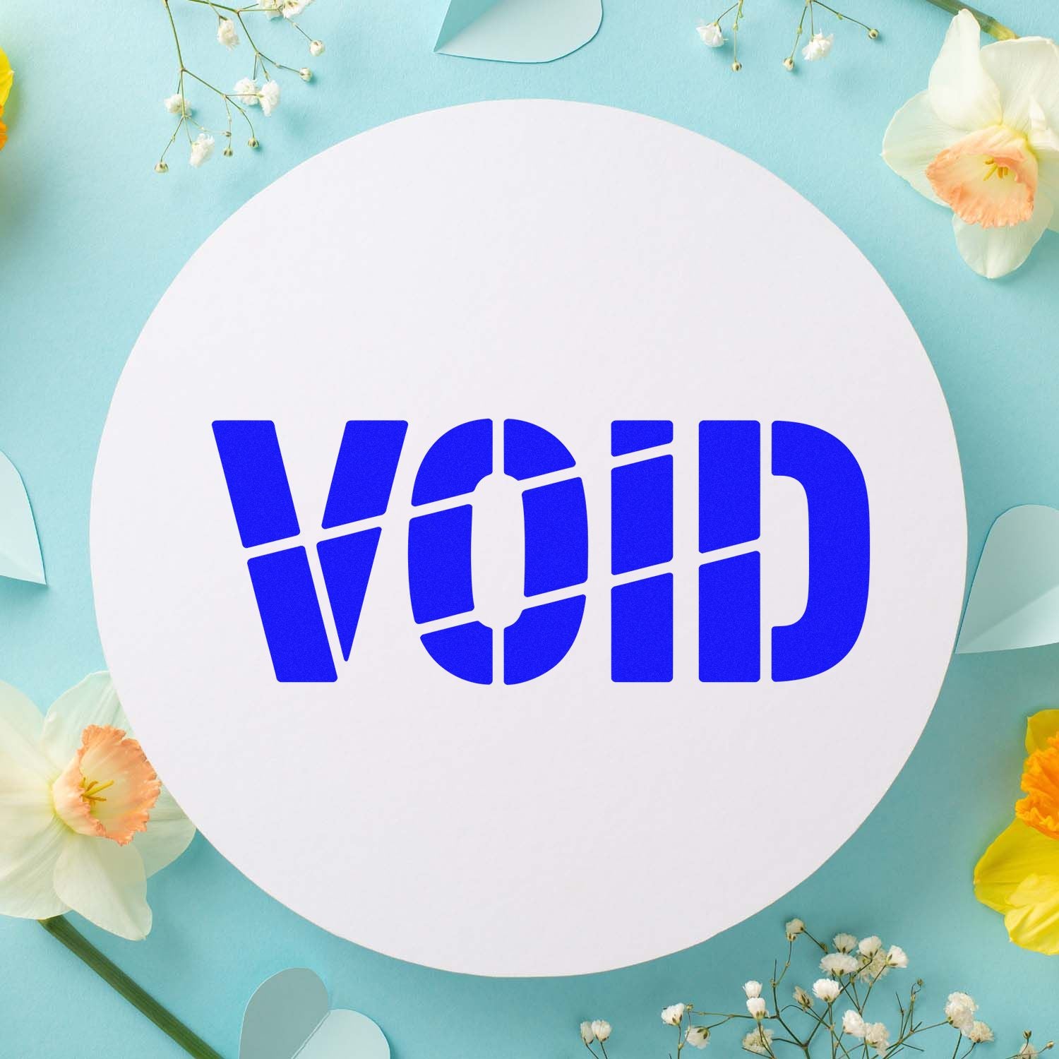 VOID rubber stamp design in bold blue lettering on a floral pastel background for marking documents, labels, or packaging.