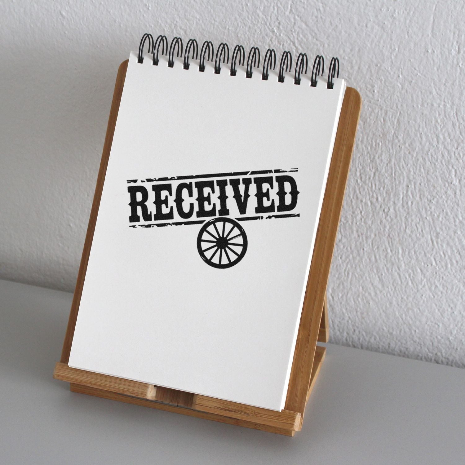 Received rubber stamp on notepad, perfect for office mail, invoices, and document processing.
