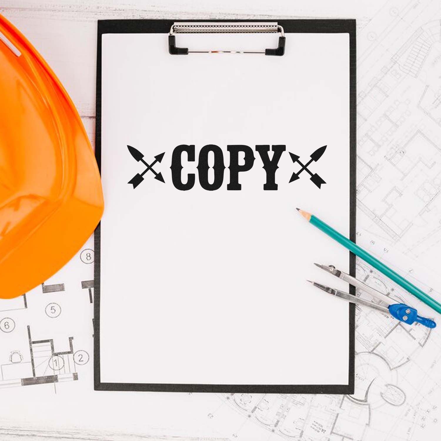 COPY rubber stamp on clipboard with construction blueprints, hard hat and drafting tools for plan duplication