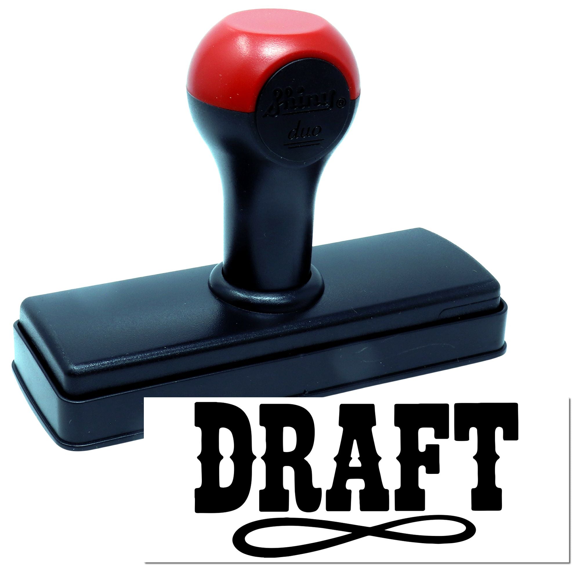 Self-inking rubber stamp with bold DRAFT imprint for marking office documents and approvals.