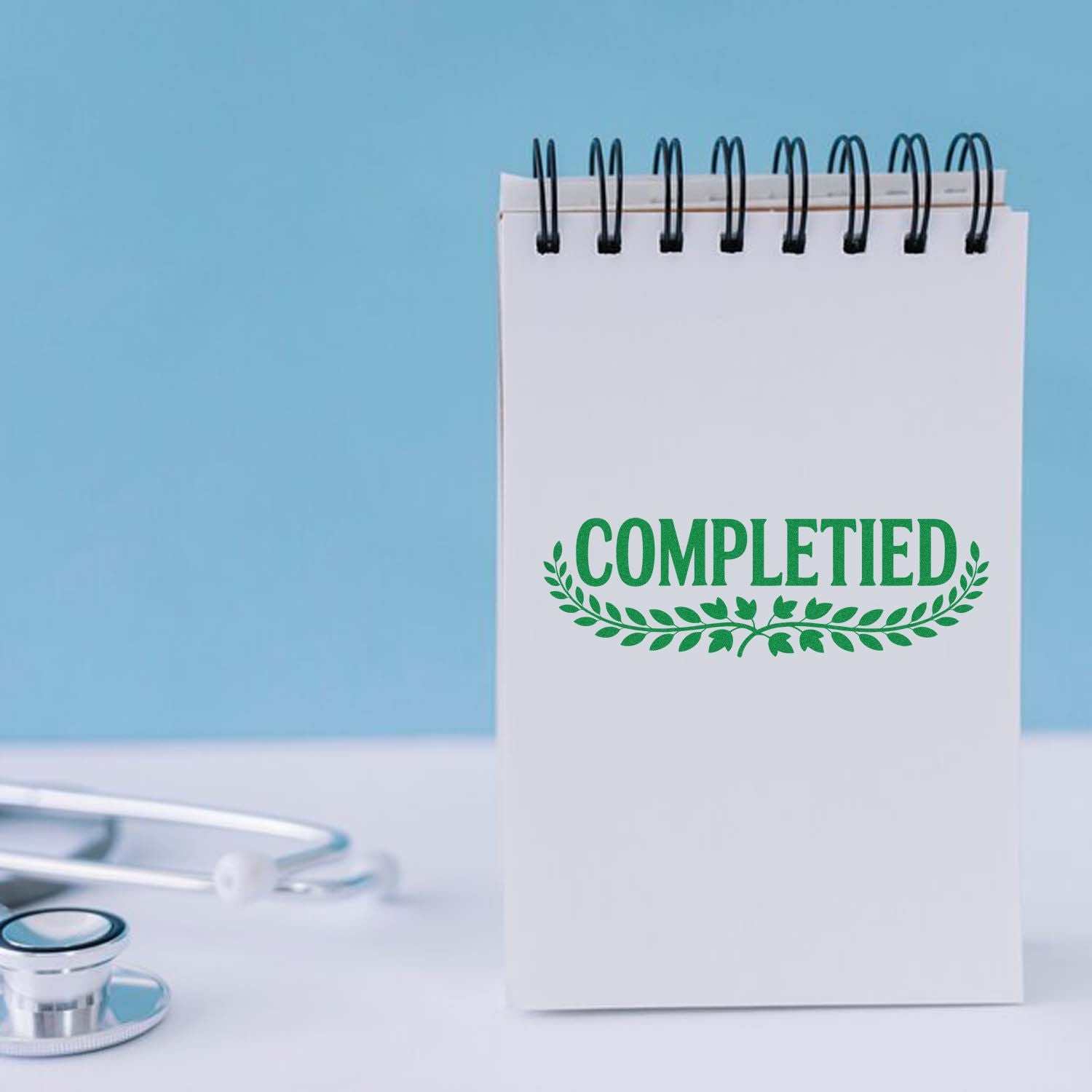 Green Completed rubber stamp on a notepad, ideal for marking medical tasks, office paperwork, or project completion.