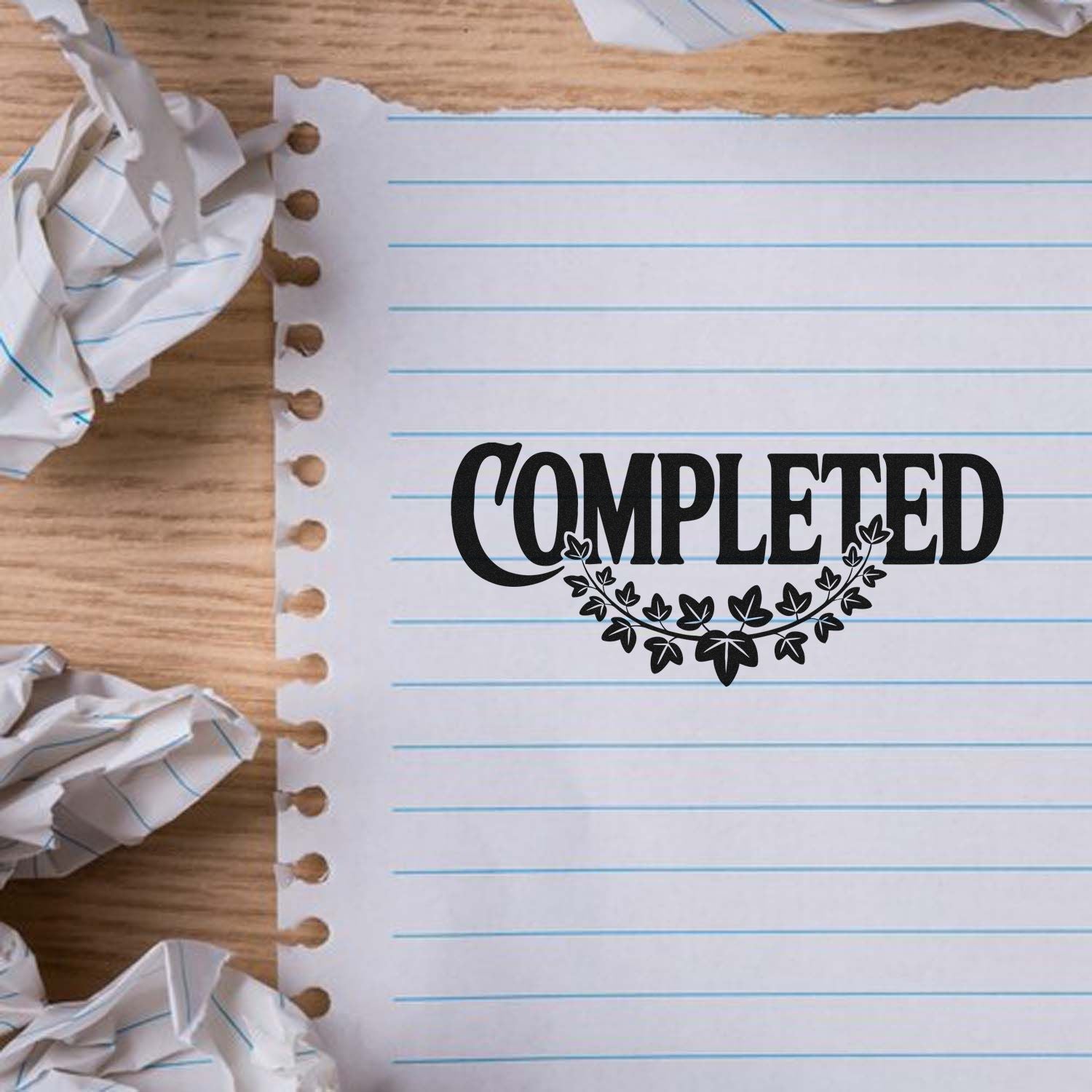 Completed rubber stamp design on lined notebook paper, ideal for office, teacher, or planner approval marks.
