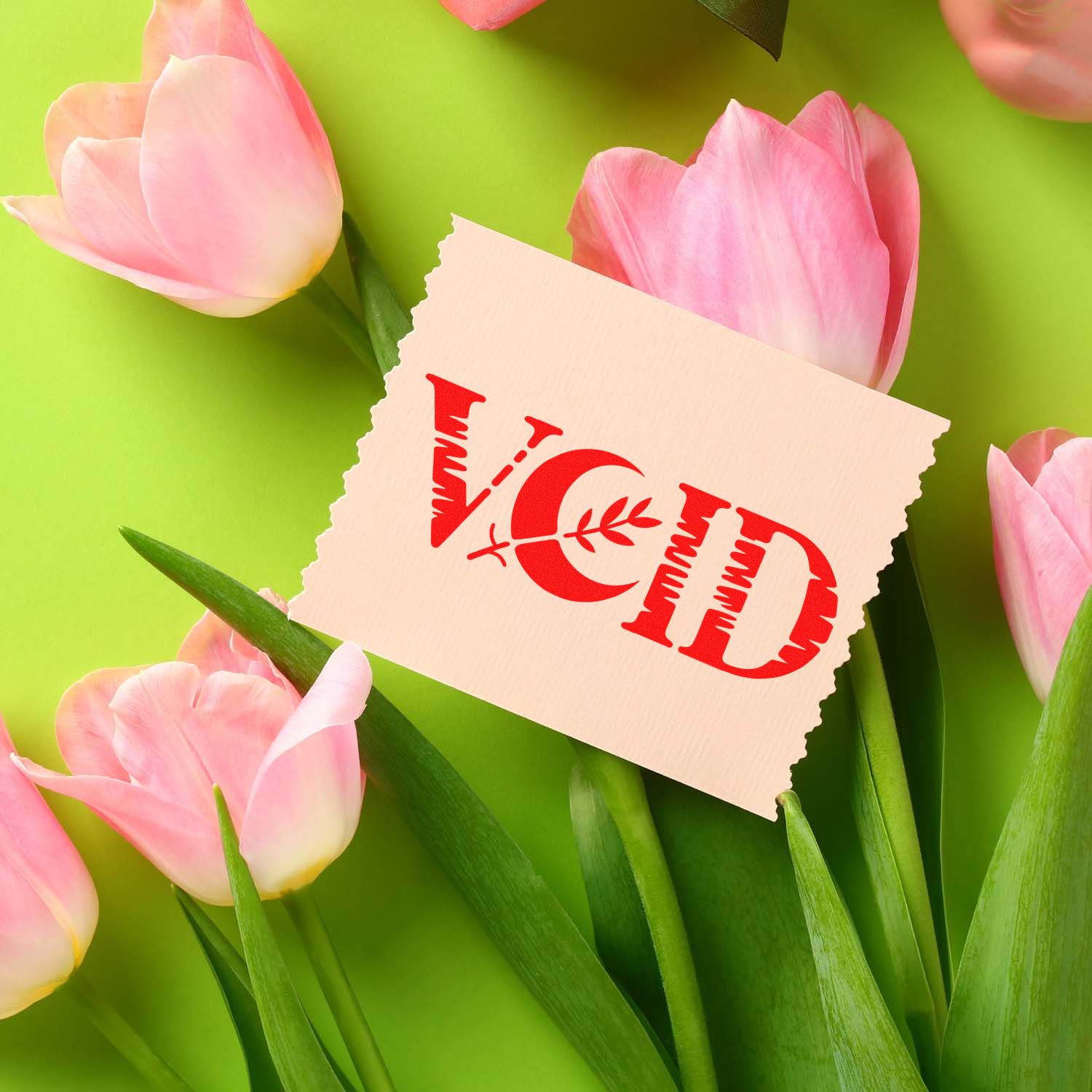 Custom VOTD rubber stamp mockup on paper with pink tulips, ideal for floral stationery branding.
