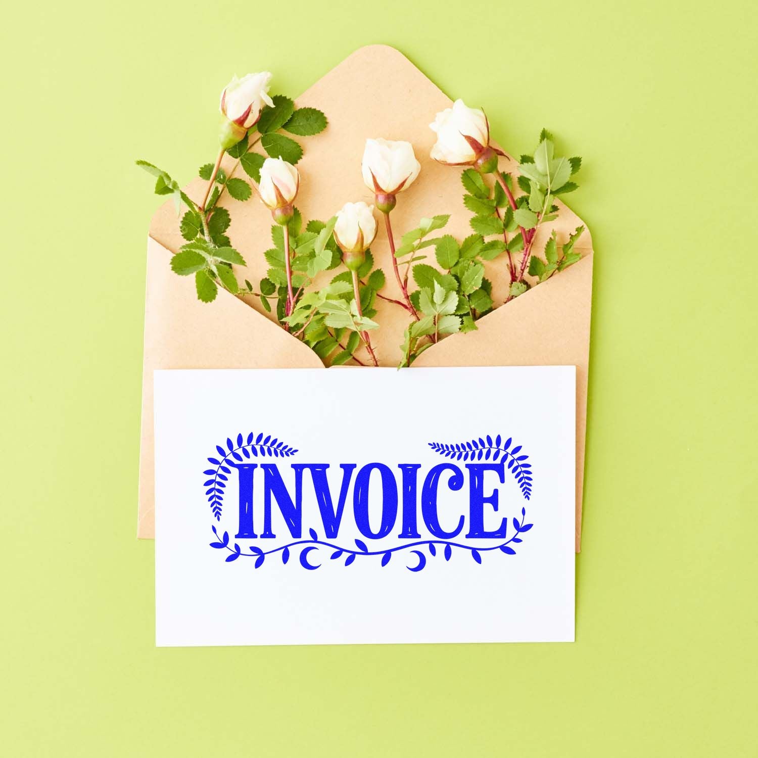 Invoice rubber stamp design on a floral envelope, ideal for business billing and mail organization.