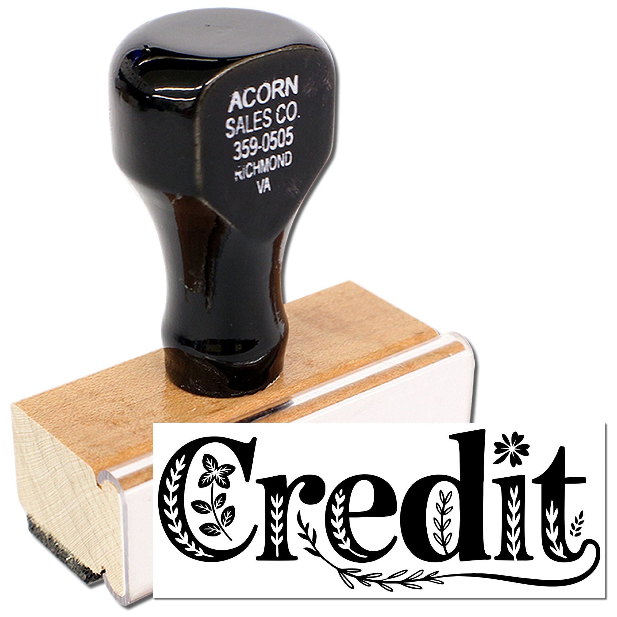Custom credit rubber stamp with wooden handle for office documents and accounting records.