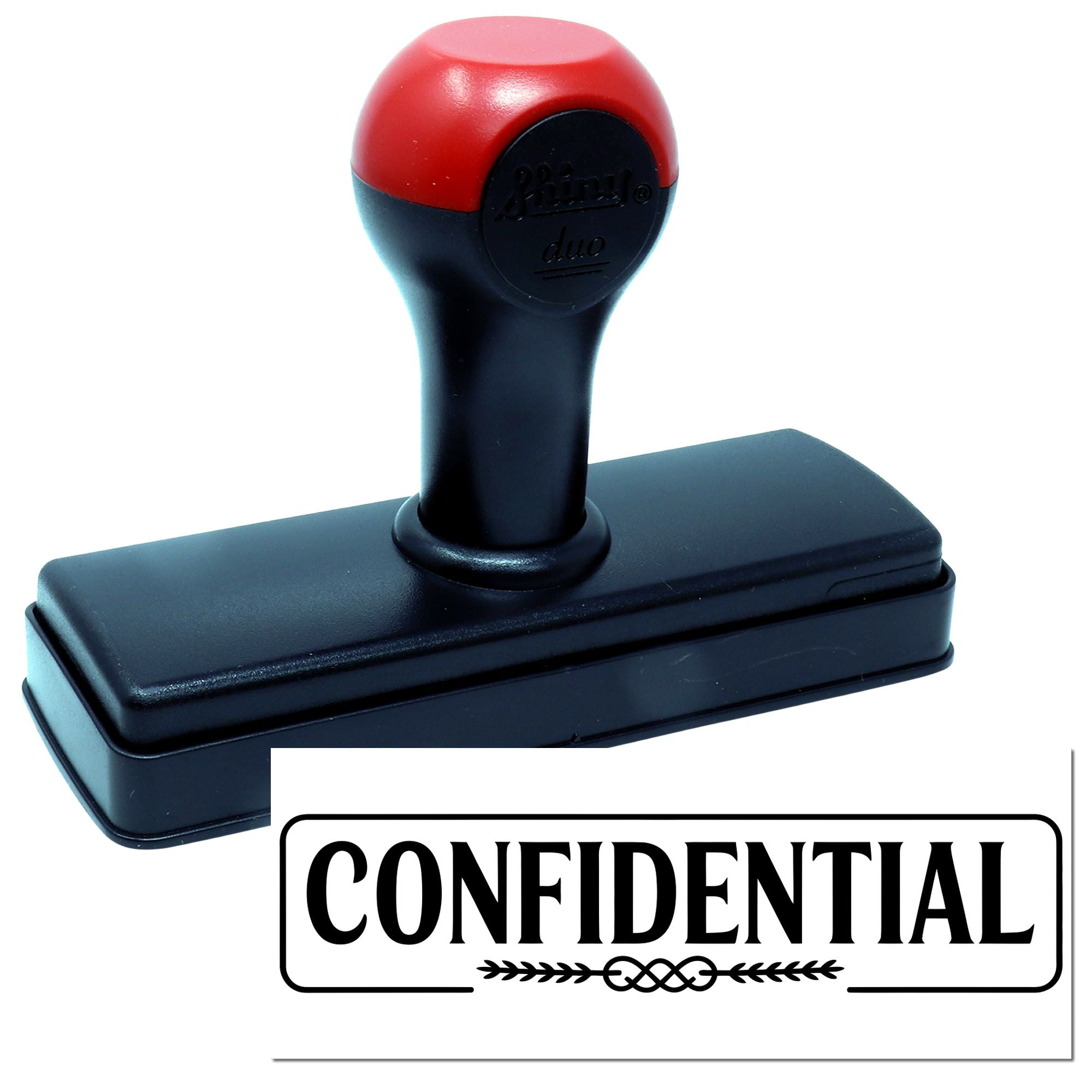 Confidential self-inking rubber stamp with bold office imprint for marking sensitive documents.