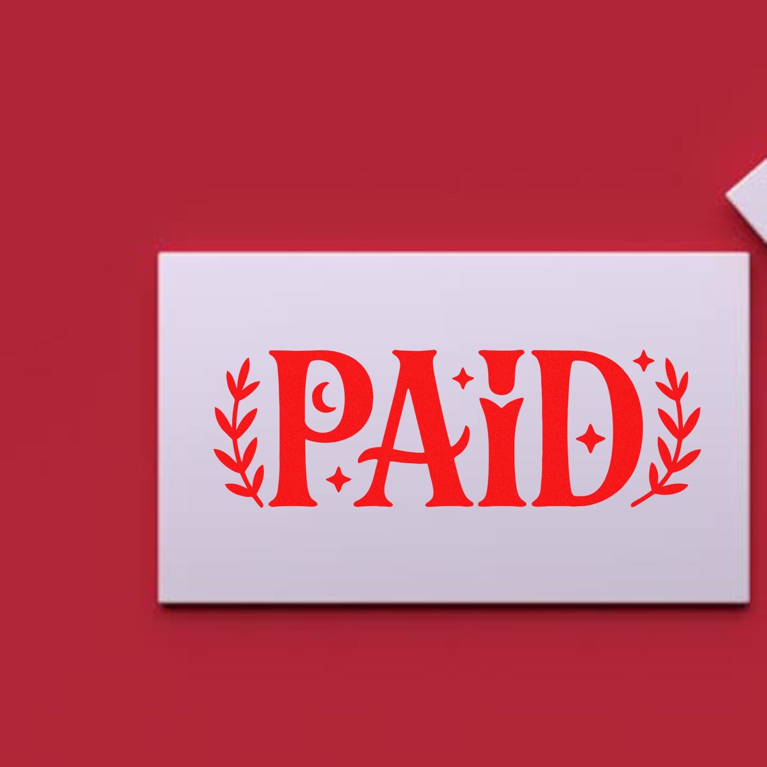 Red PAID rubber stamp design on white card for invoice approval and payment confirmation.
