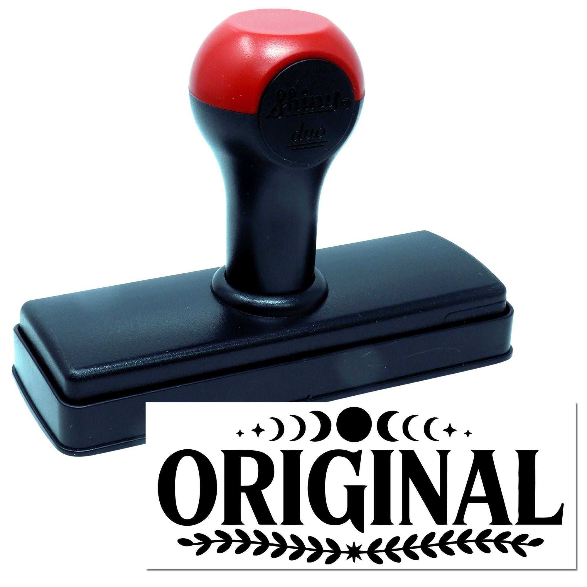 Self-inking rubber stamp with ORIGINAL decorative imprint for branding, packaging, or approval marking.