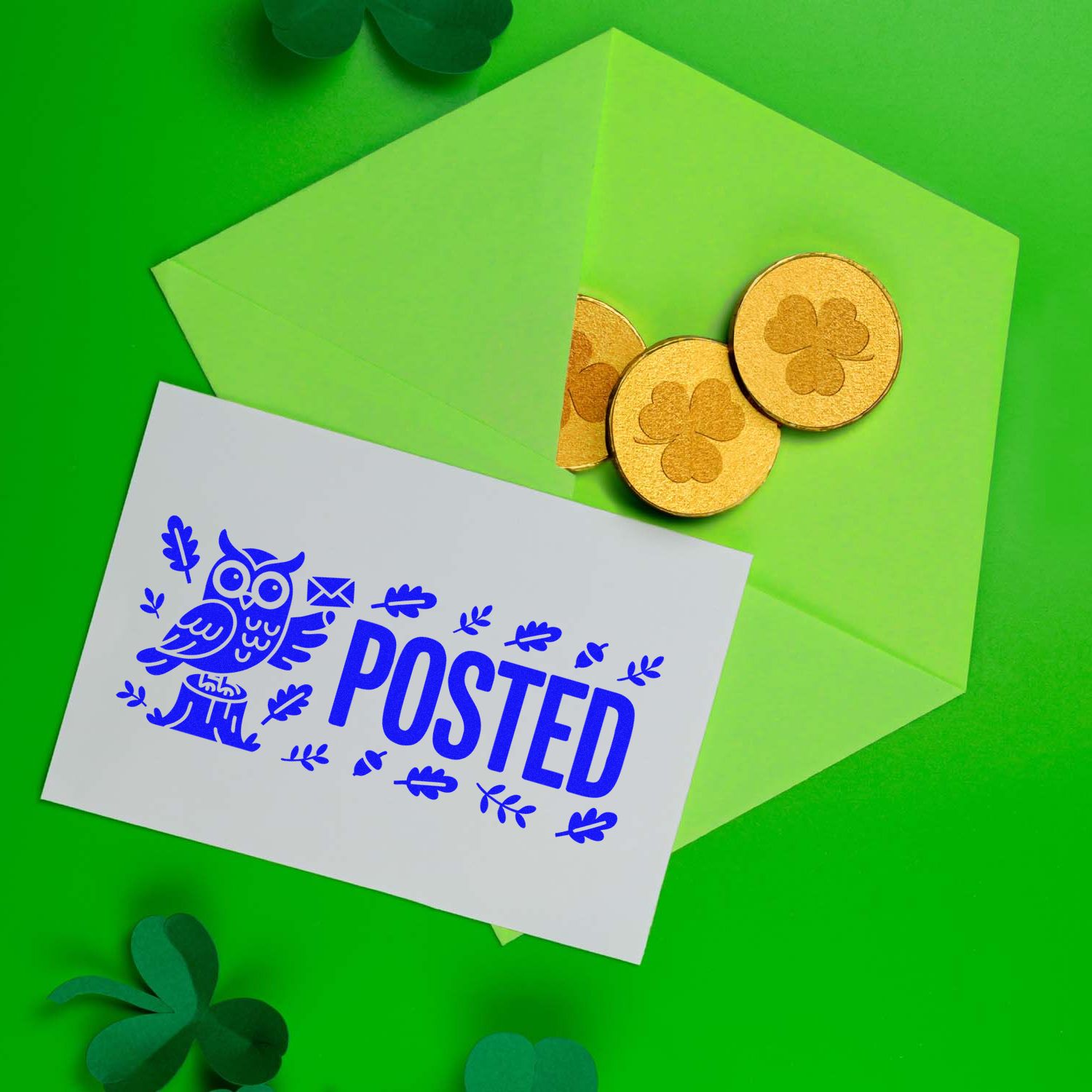 Custom rubber stamp POSTED on card with St. Patricks Day envelopes and gold shamrock coins.