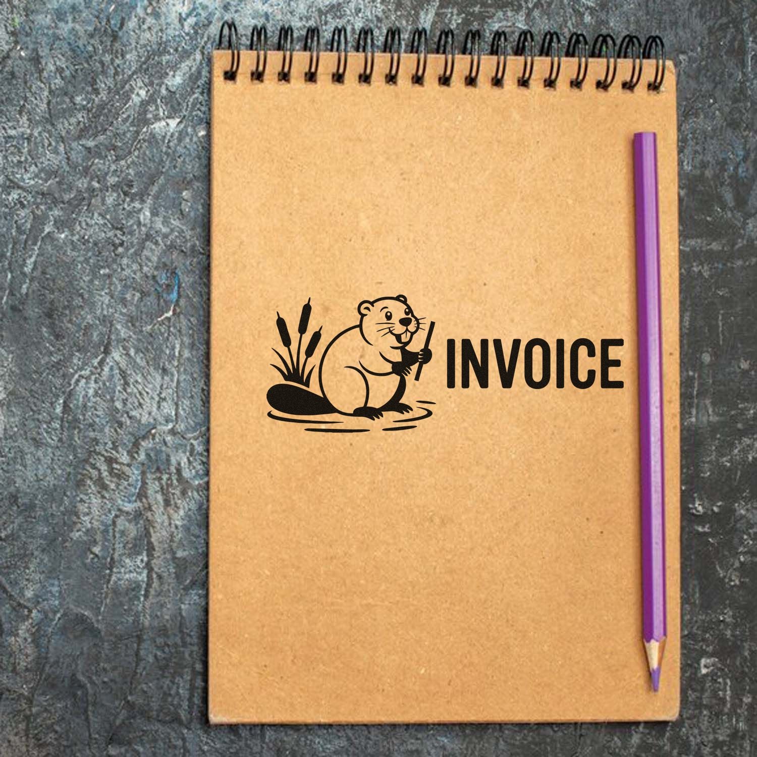 Beaver invoice rubber stamp on kraft notebook, ideal for office billing, bookkeeping, and custom business stamps.