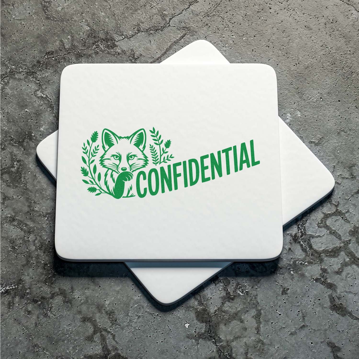 Custom rubber stamp with fox and leaves design, marked CONFIDENTIAL for office document security.