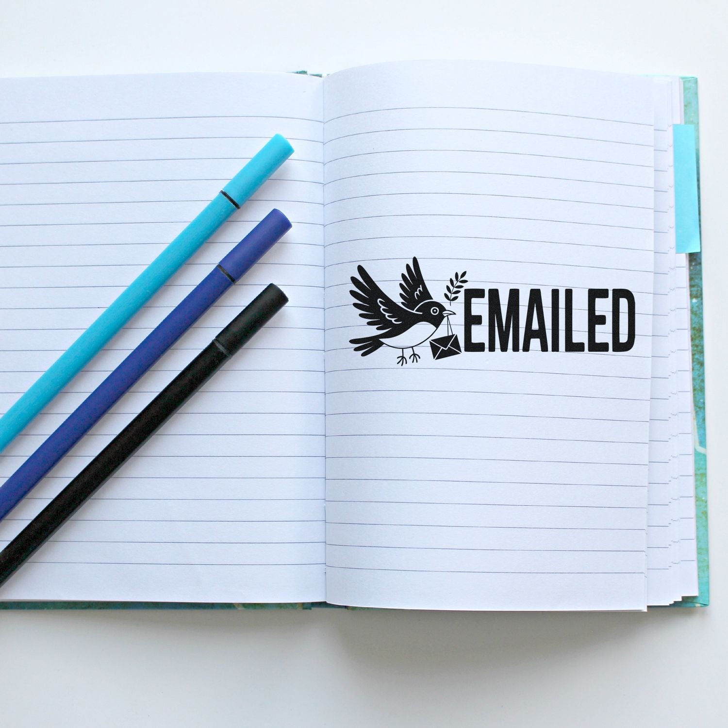 EMAILED rubber stamp with bird icon on open notebook, used for office mail tracking, planners, and business organization.