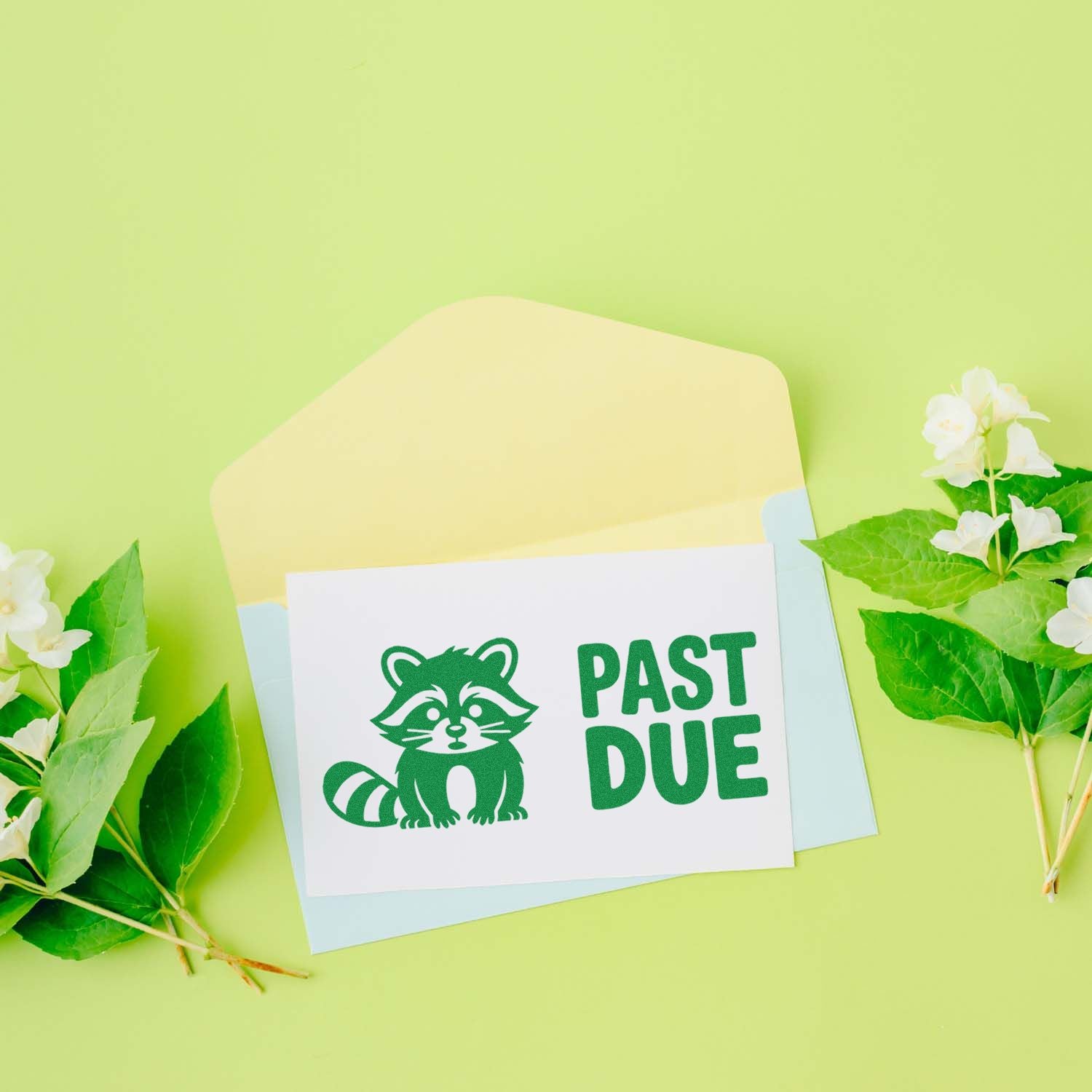 Past due raccoon rubber stamp design on envelope, a playful overdue payment reminder for stationery, mailers and crafts.