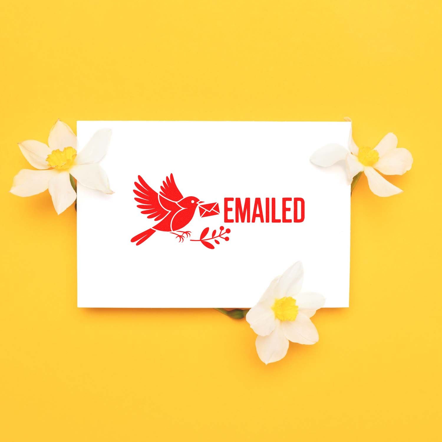 Red Emailed rubber stamp with bird and envelope on white card, ideal for mail tracking and office document processing.