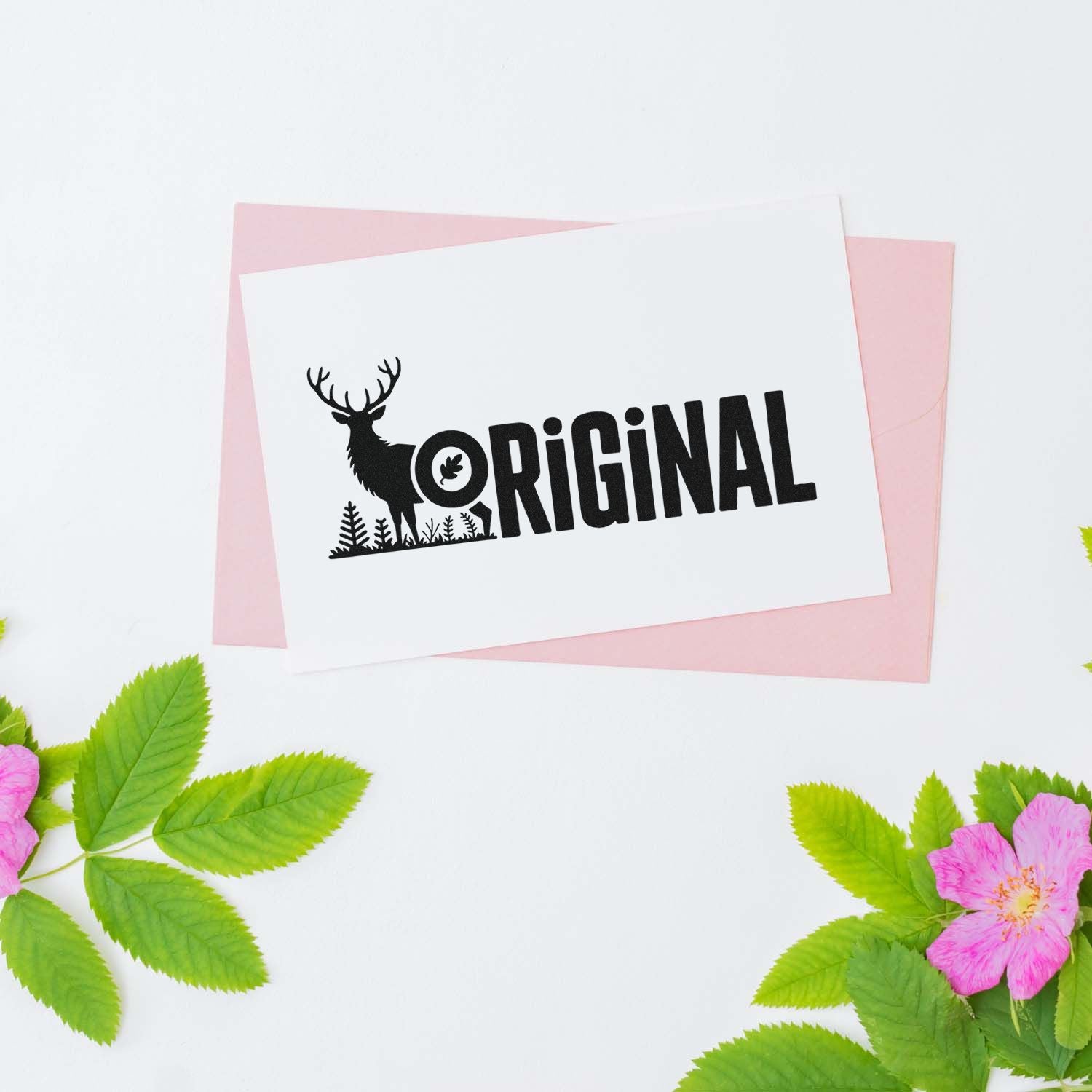 Custom deer logo rubber stamp impression with ORIGINAL text on greeting card, ideal for handmade branding and packaging.