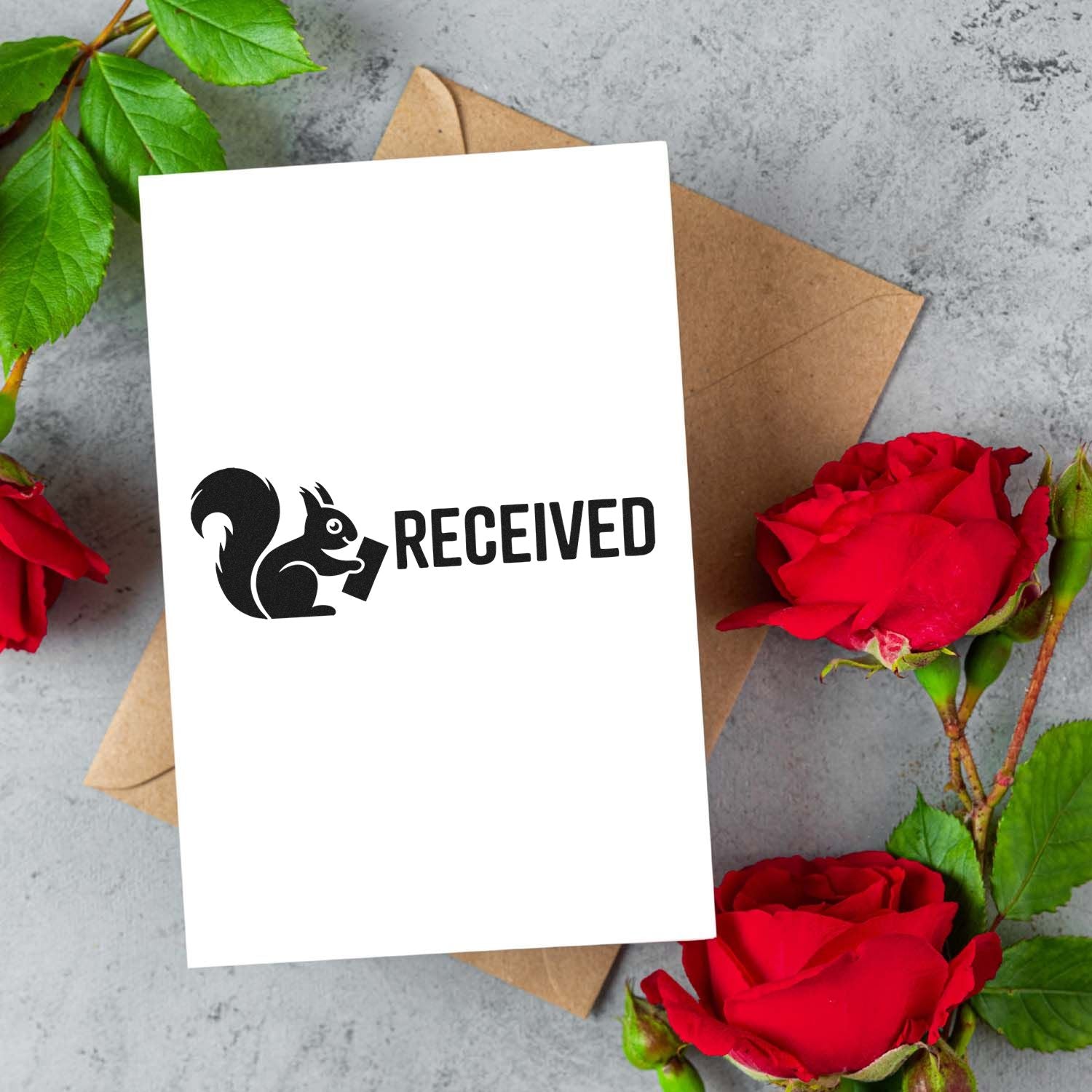 Received rubber stamp mockup with squirrel icon on card, ideal for custom mail, packaging, and office received stamps.