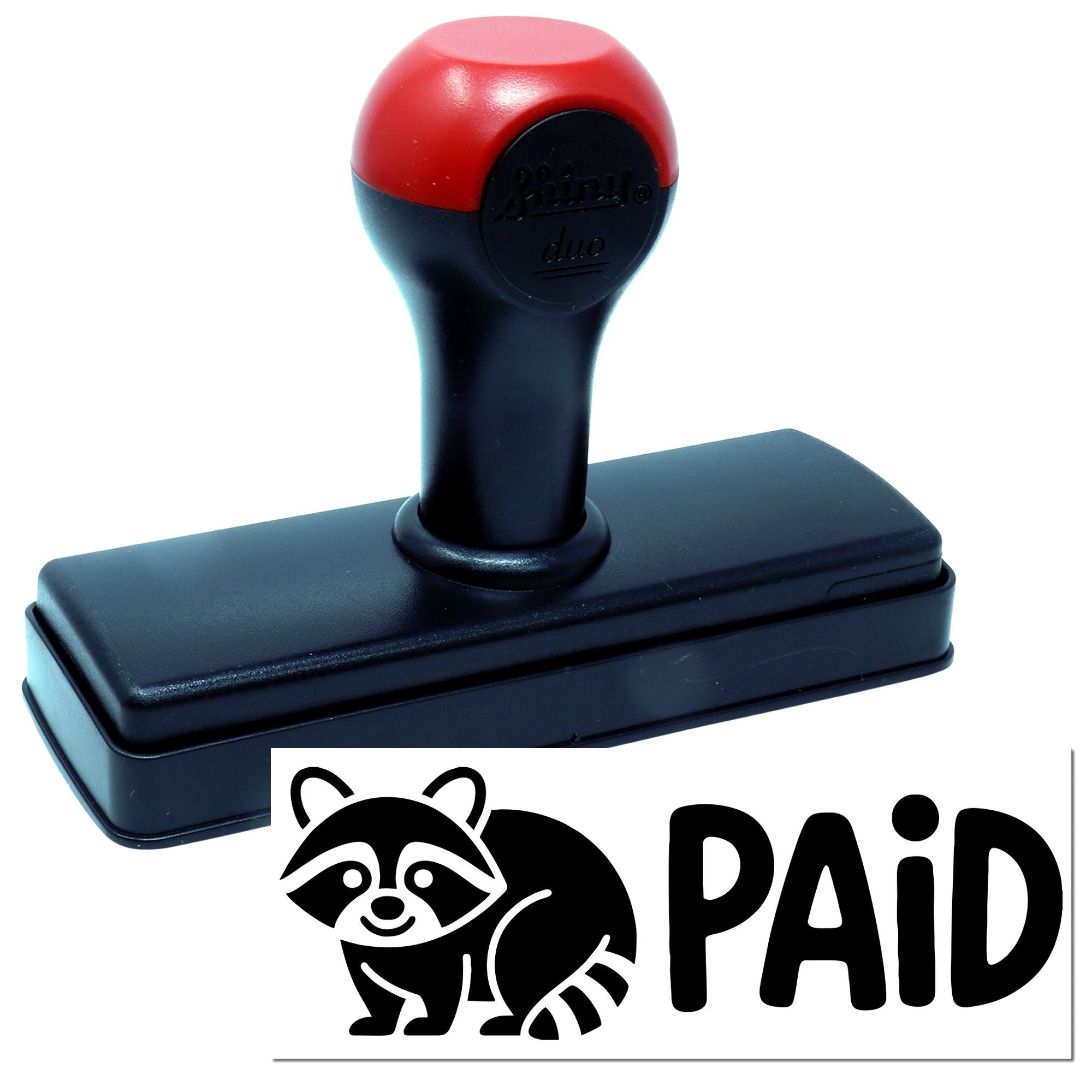 Self-inking PAID rubber stamp with raccoon design for office documents, bookkeeping, and payment marking.
