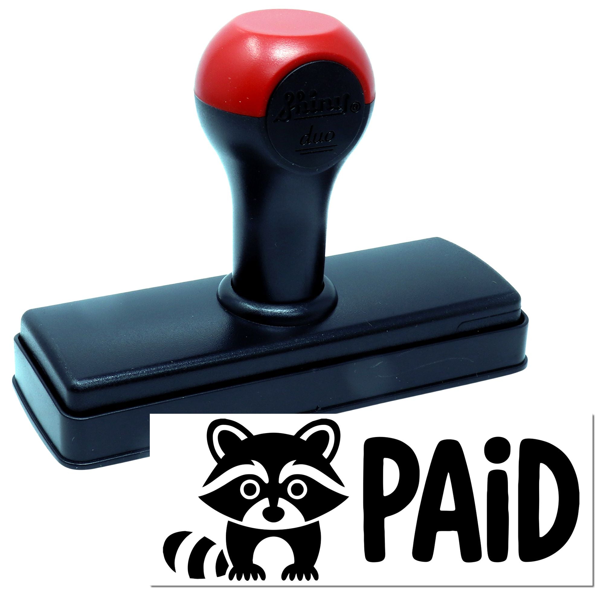 Self-inking rubber stamp product with PAID raccoon logo, used for office document approval and bookkeeping.