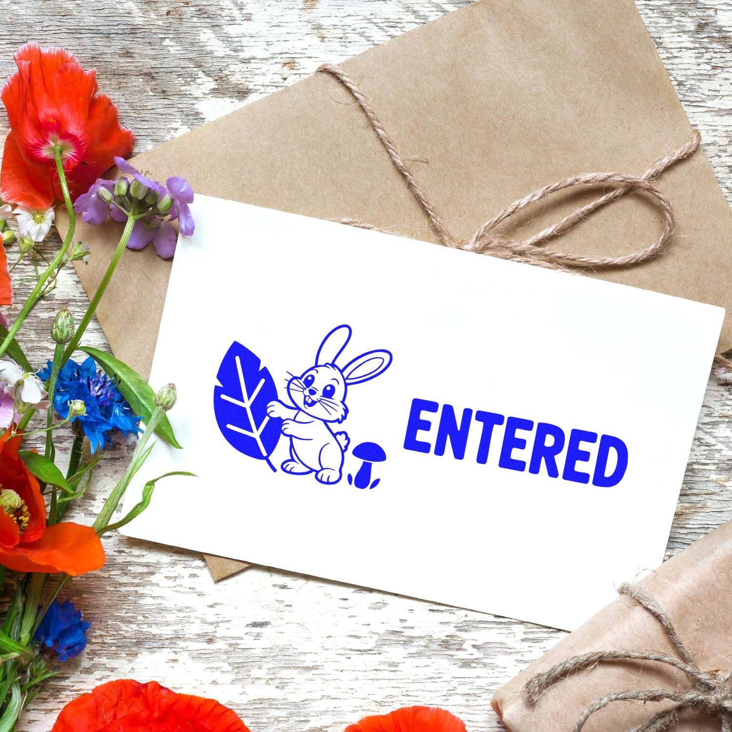 Bunny ENTERED rubber stamp on envelope for craft packaging, mail sorting, and business use