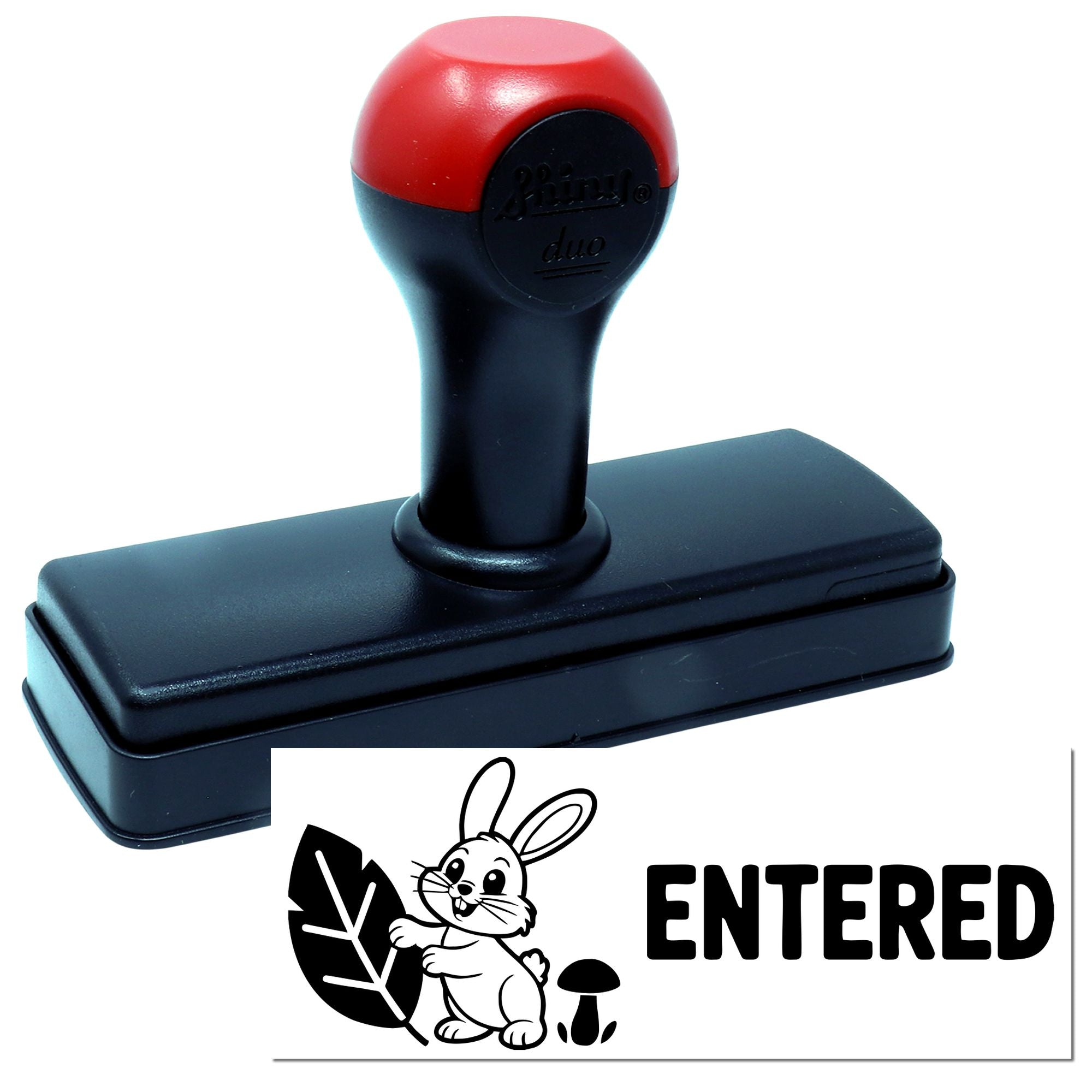 Custom self-inking rubber stamp with rabbit and ENTERED imprint for office document marking