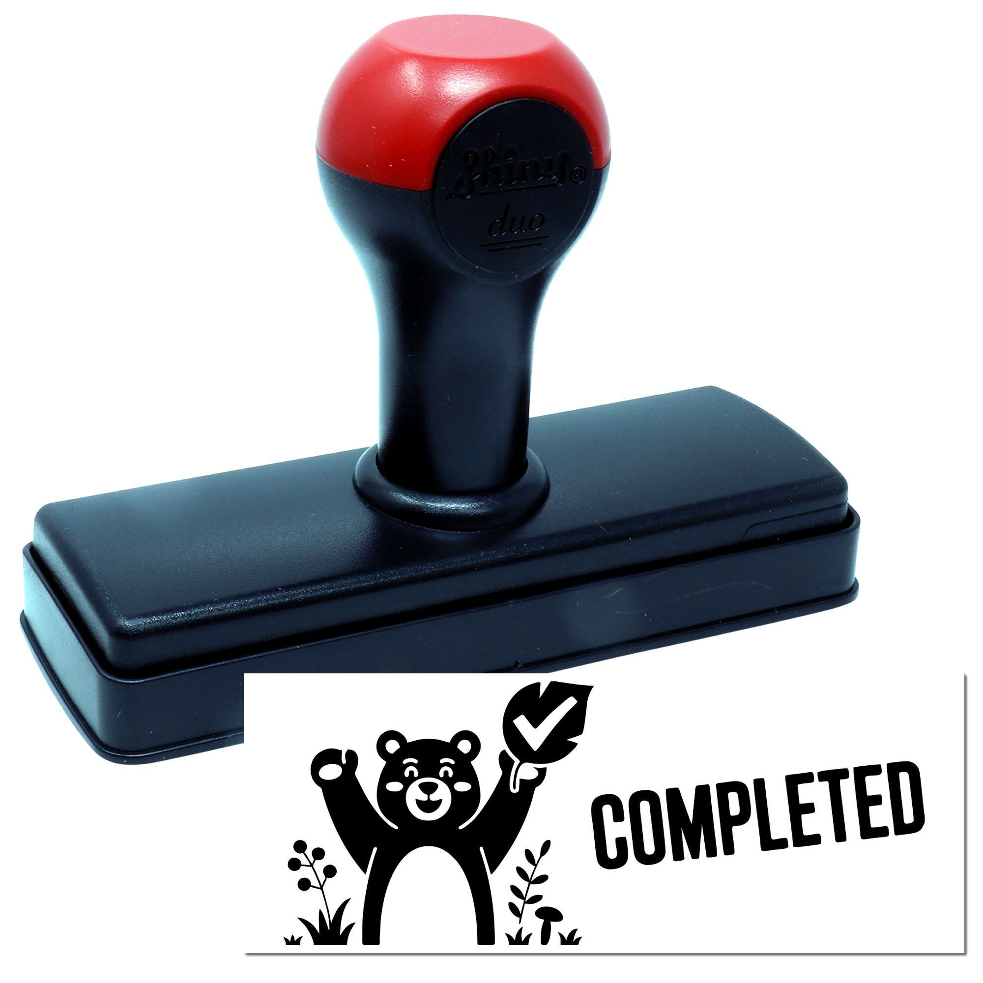 Self-inking rubber stamp with completed bear design and bold COMPLETED imprint for office approval or craft use.